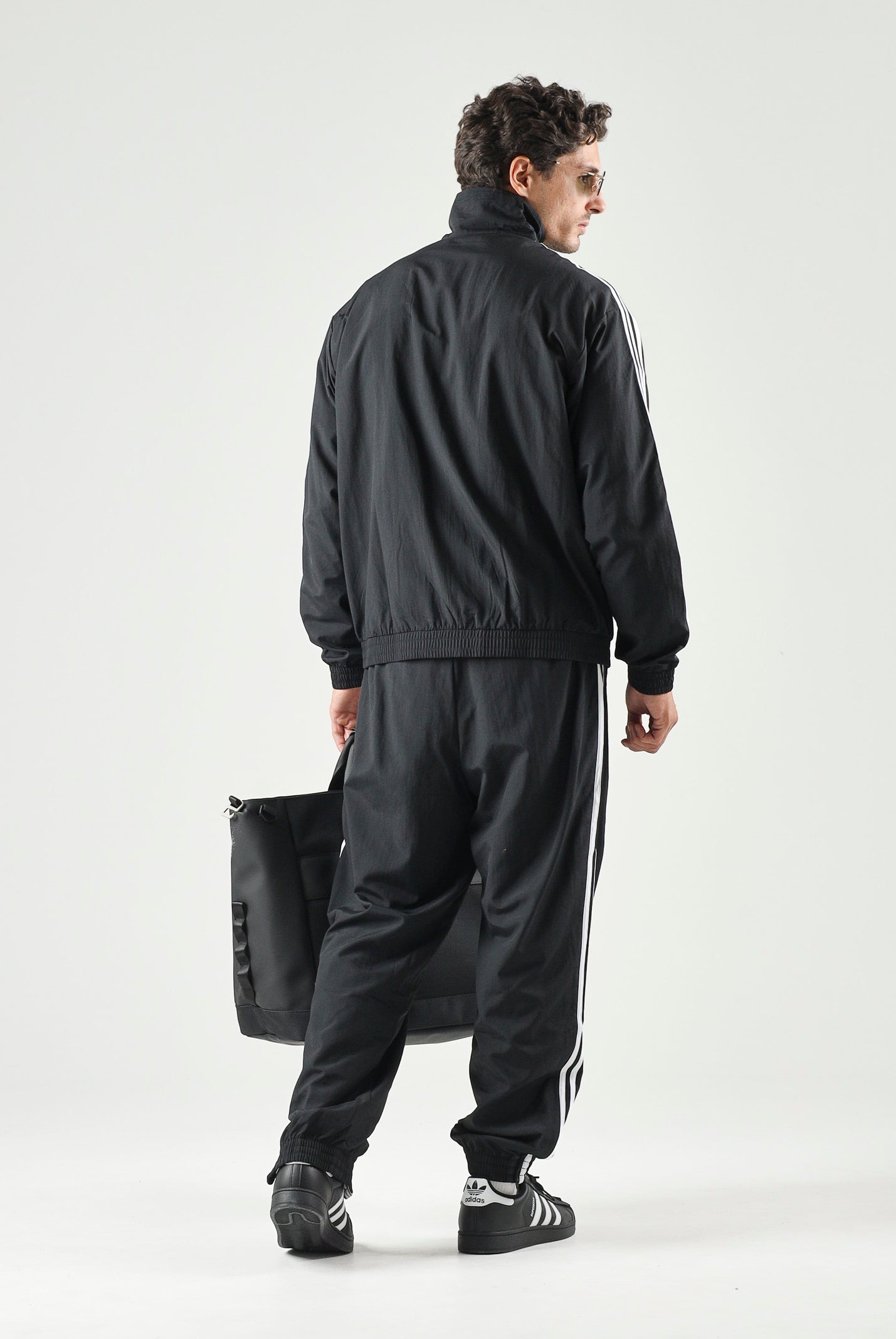ADIDAS ORIGINALS Giacca a vento Firebird Woven nera da uomo KE1366 . ADIDAS ORIGINALS