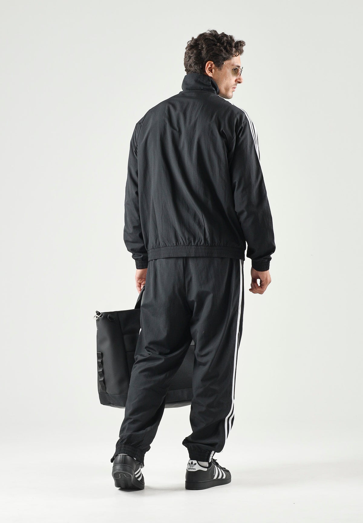 ADIDAS ORIGINALS Giacca a vento Firebird Woven nera da uomo KE1366 . ADIDAS ORIGINALS