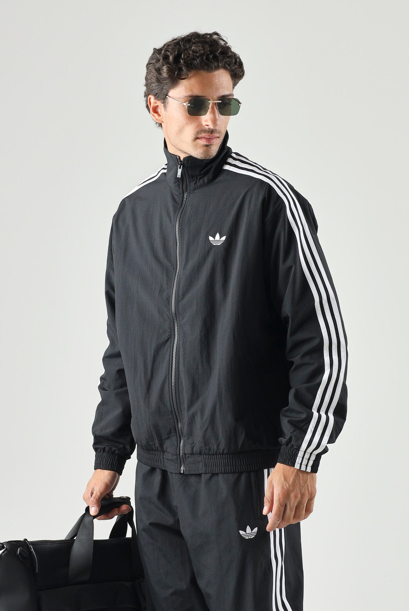 ADIDAS ORIGINALS Giacca a vento Firebird Woven nera da uomo KE1366 . ADIDAS ORIGINALS