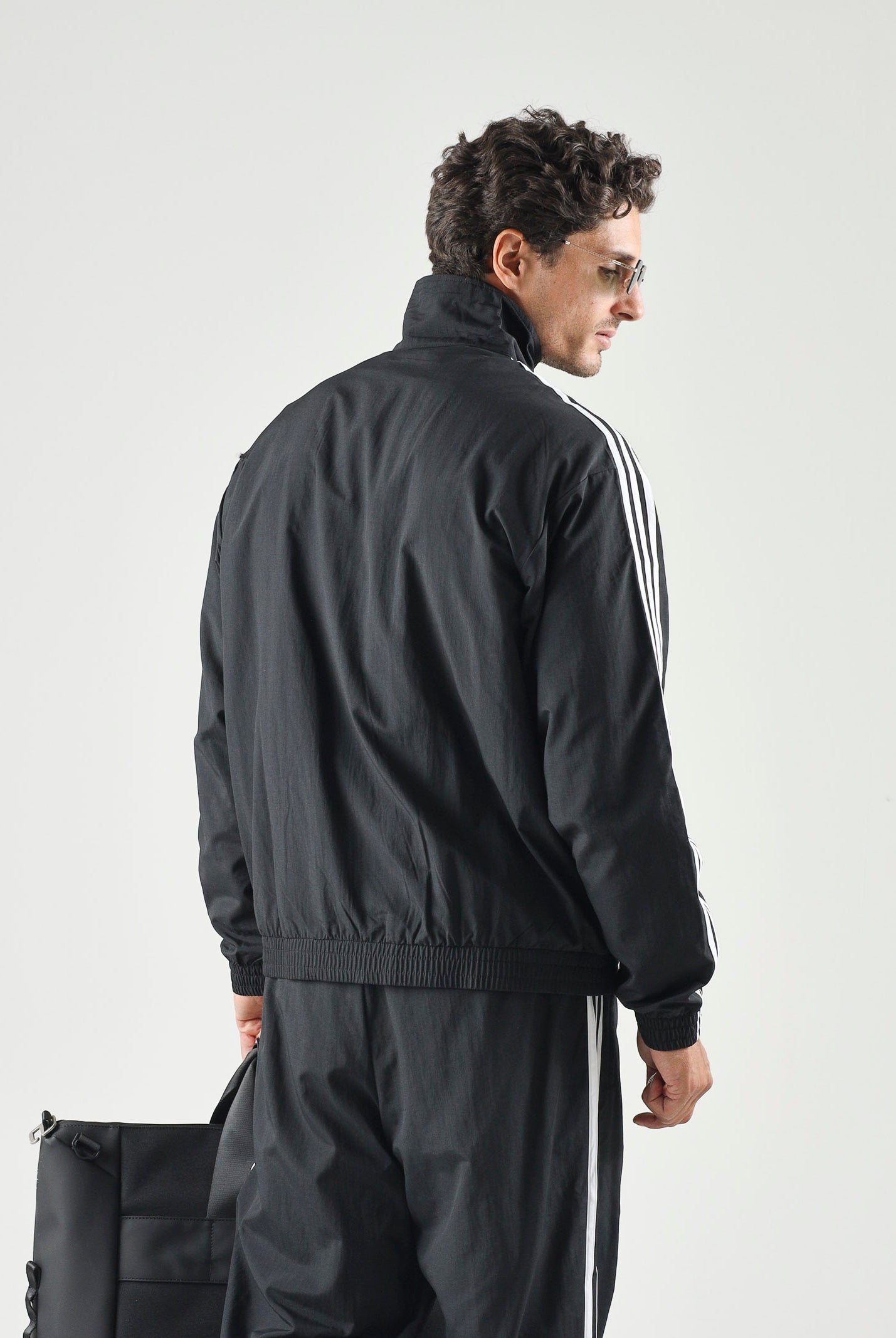 ADIDAS ORIGINALS Giacca a vento Firebird Woven nera da uomo KE1366 . ADIDAS ORIGINALS