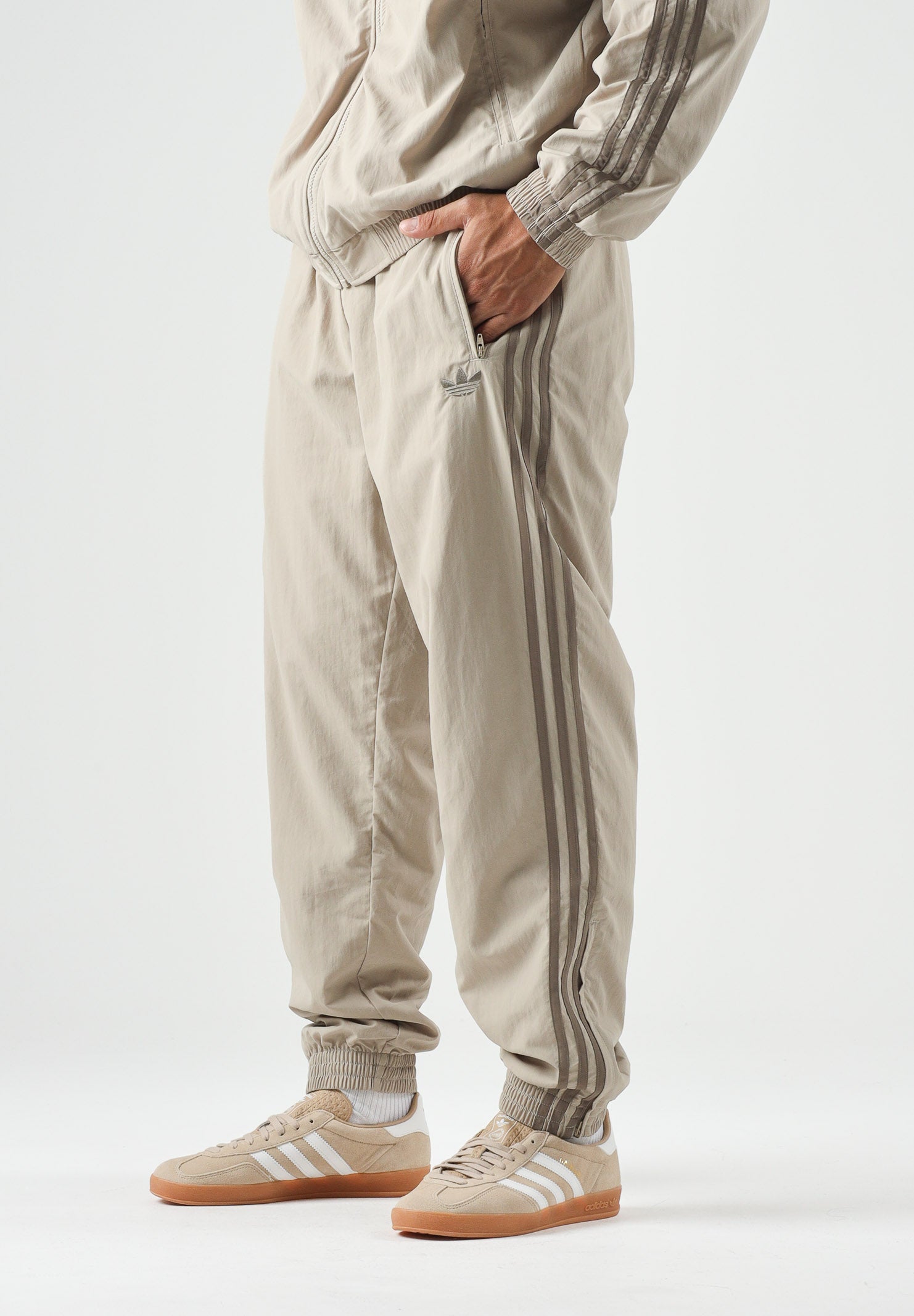 ADIDAS ORIGINALS Pantaloni FIREBIRD WOVEN kaki beige da uomo<BR/> KS7503 . ADIDAS ORIGINALS