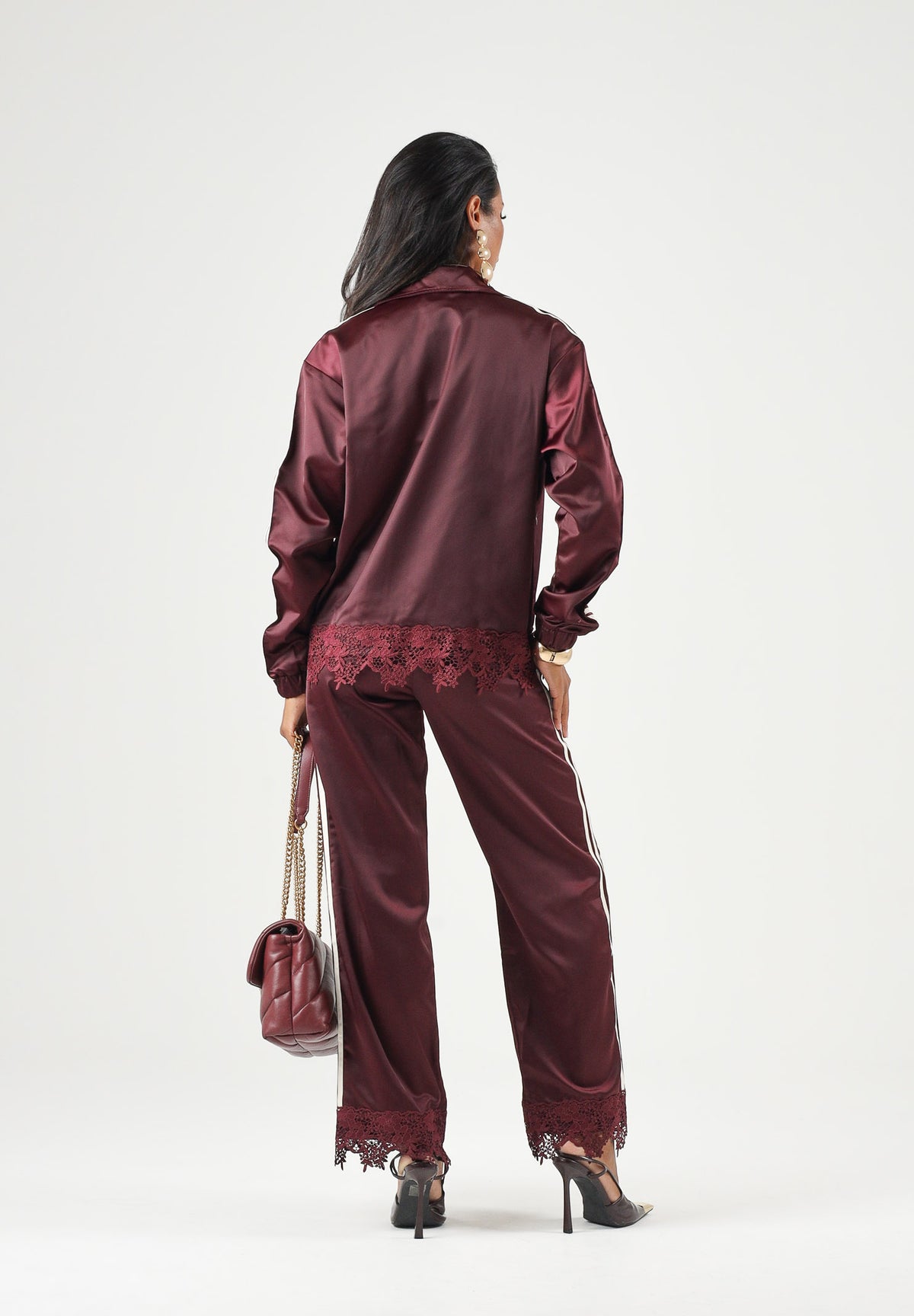 ADIDAS ORIGINALS Felpa con zip Firebird bordeaux da donna in tessuto satinato LD1804 . ADIDAS ORIGINALS
