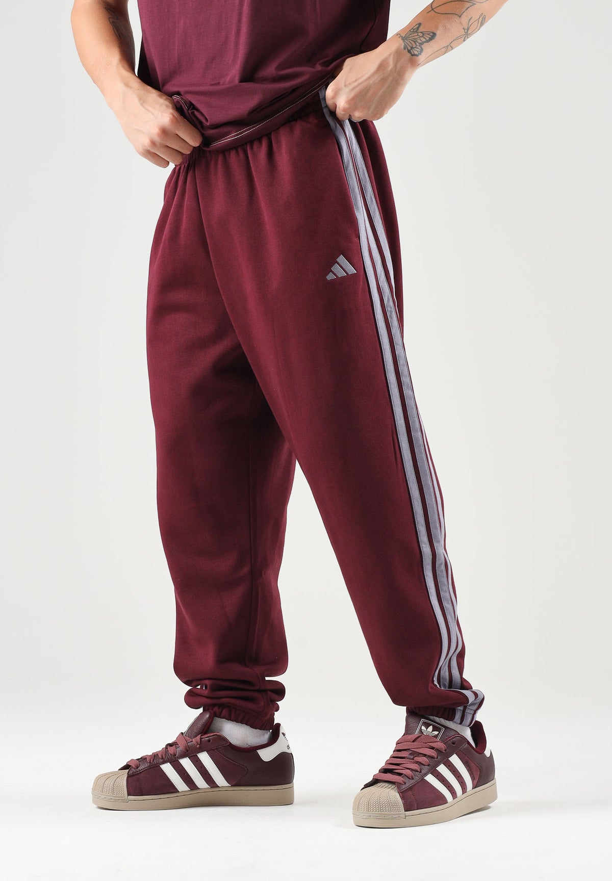 ADIDAS PERFORMANCE Pantaloni sportivi ESSENTIALS 3-STRIPES bordeaux per uomo e donna<BR/> KY4134 . ADIDAS PERFORMANCE