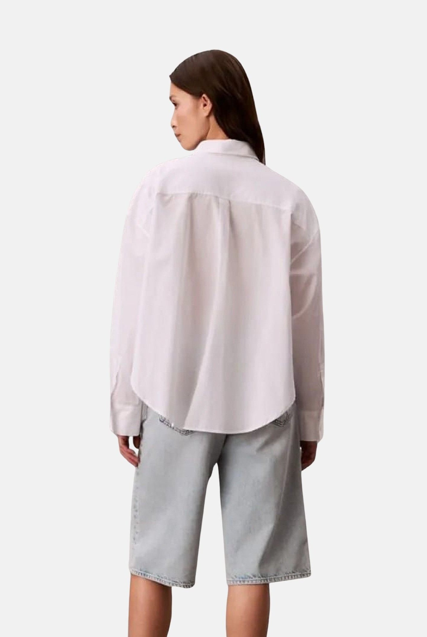 CALVIN KLEIN JEANS Camicia BRILLIANT bianco, da donna con logo ricamato sul petto<BR/> LV047F104G YAA CALVIN KLEIN JEANS