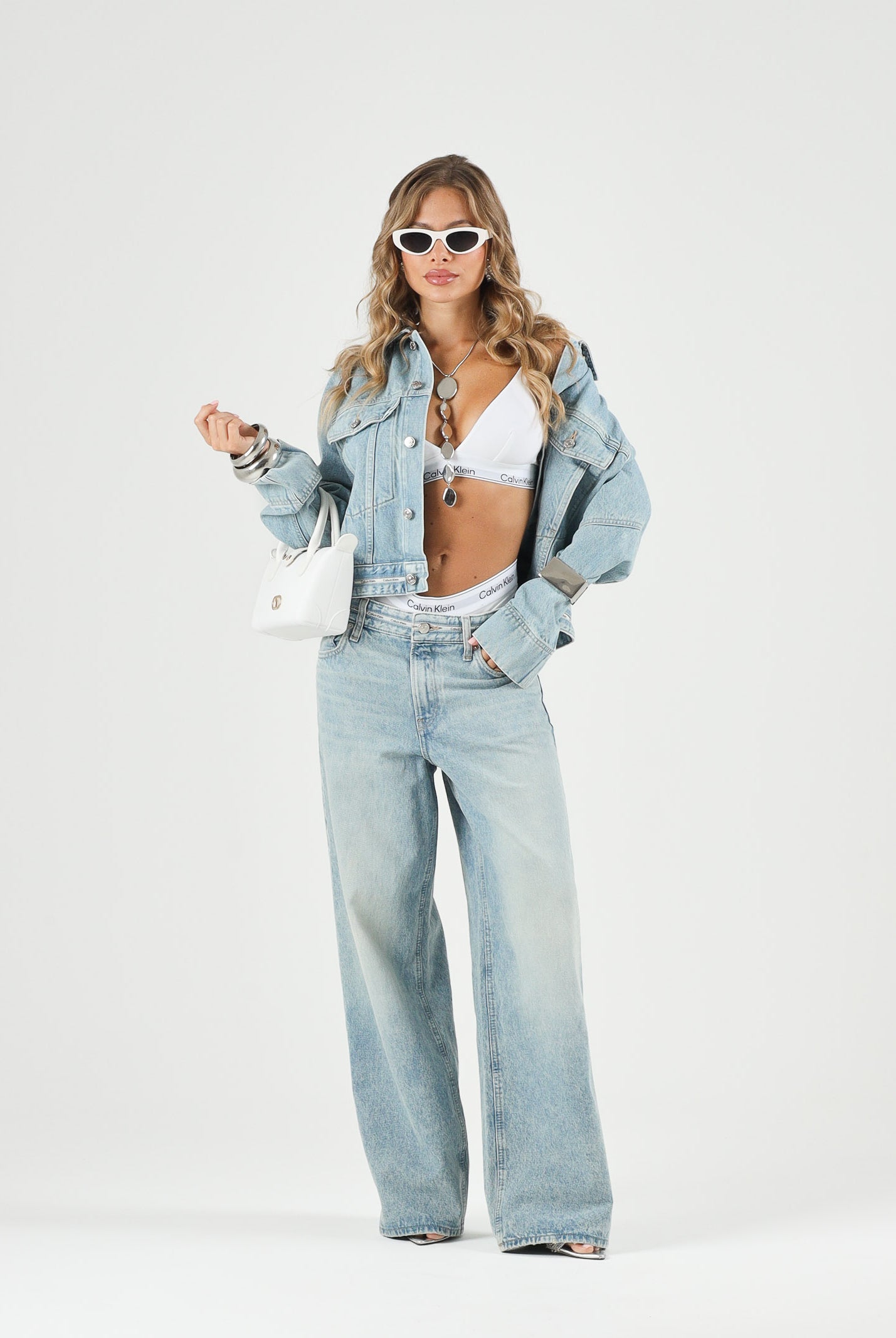 CALVIN KLEIN JEANS Giacca BOXY di jeans, tape denim azzurro chiaro da donna con nastro logato Calvin Klein.<BR/> LV047G726G YP3 CALVIN KLEIN JEANS