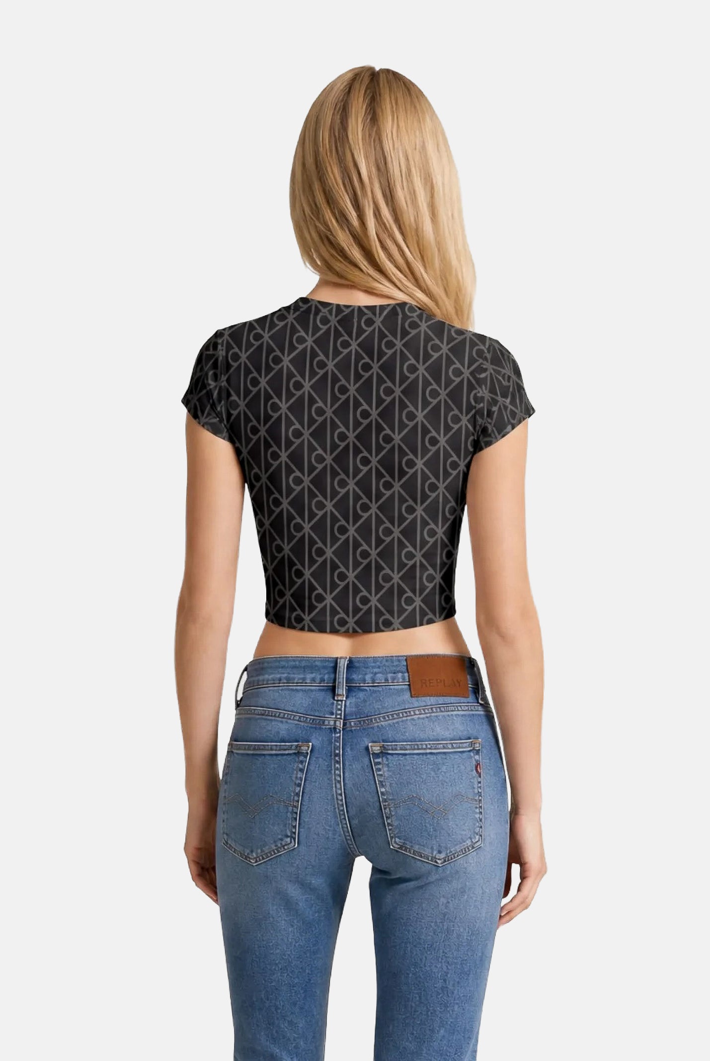 CALVIN KLEIN JEANS T-shirt EMBLEM PRINT, ebony nero da donna con motivo monogramma CK all-over.<BR/> LV047G830G 4XN CALVIN KLEIN JEANS