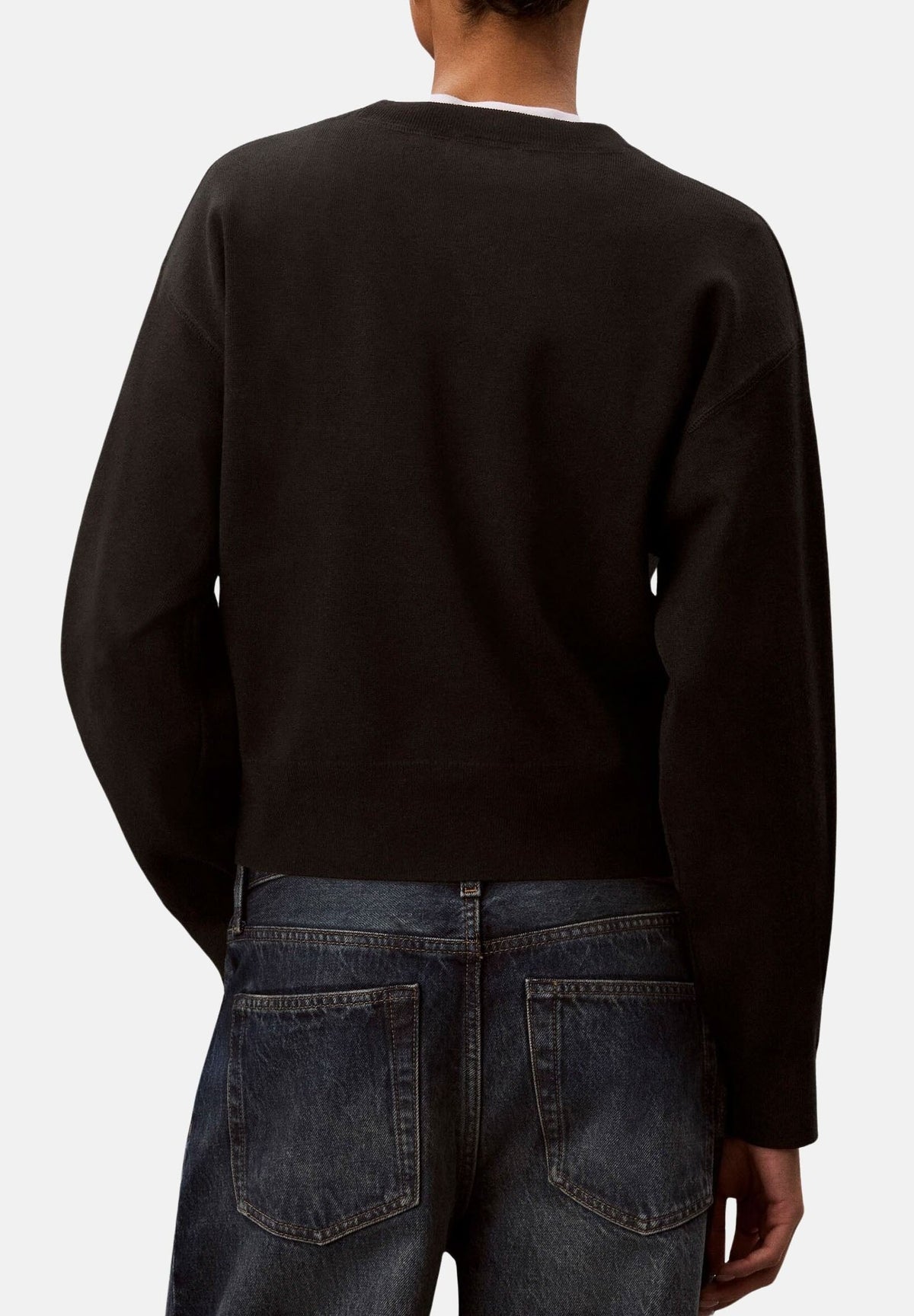 CALVIN KLEIN JEANS Maglia girocollo LOGO OTTOMAN LS PULL Black nera da donna, con maxi logo CK in rilievo tono su tono sul petto, maniche lunghe, spalle scese e bordi rifiniti a costine. LV047H315G UB1 CALVIN KLEIN JEANS