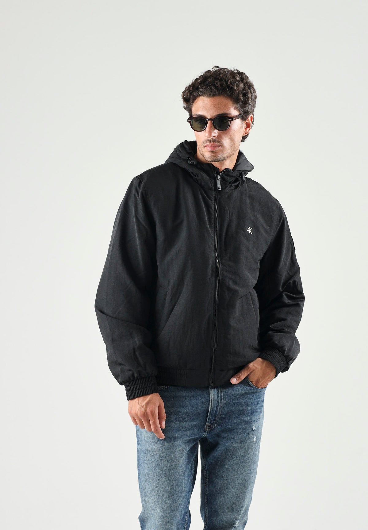 CALVIN KLEIN JEANS Giacca a vento con cappuccio nero da uomo con logo iconico LV04RG501G UB1 CALVIN KLEIN JEANS