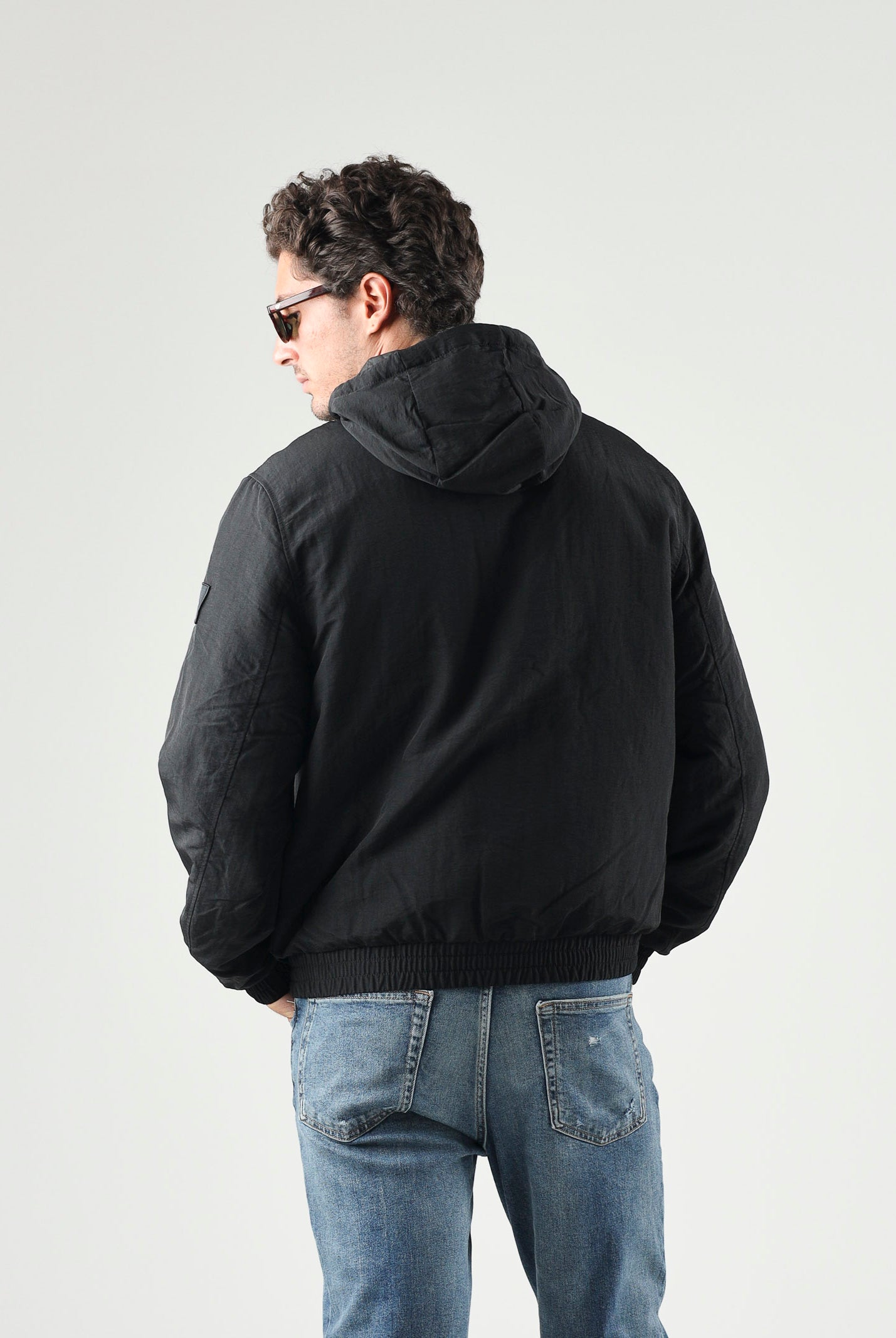 CALVIN KLEIN JEANS Giubbotto con cappuccio nero da uomo con logo iconico LV04RG501G UB1 CALVIN KLEIN JEANS