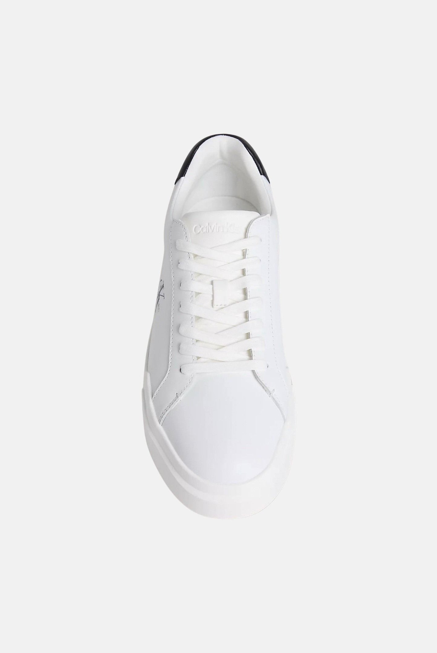 CALVIN KLEIN JEANS Sneakers in pelle bianche e nere da uomo con dettagli neri a contrasto e monogramma CK laterale.<BR/> YM0YM01344 06X CALVIN KLEIN JEANS