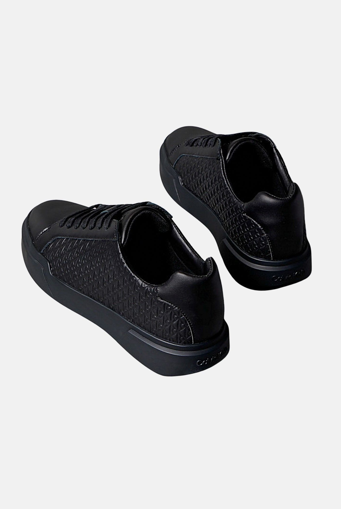CALVIN KLEIN JEANS Sneakers DURABLE TRACTION, nere da uomo<BR/>con motivo monogramma CK all-over in rilievo YM0YM01383 0GJ CALVIN KLEIN JEANS