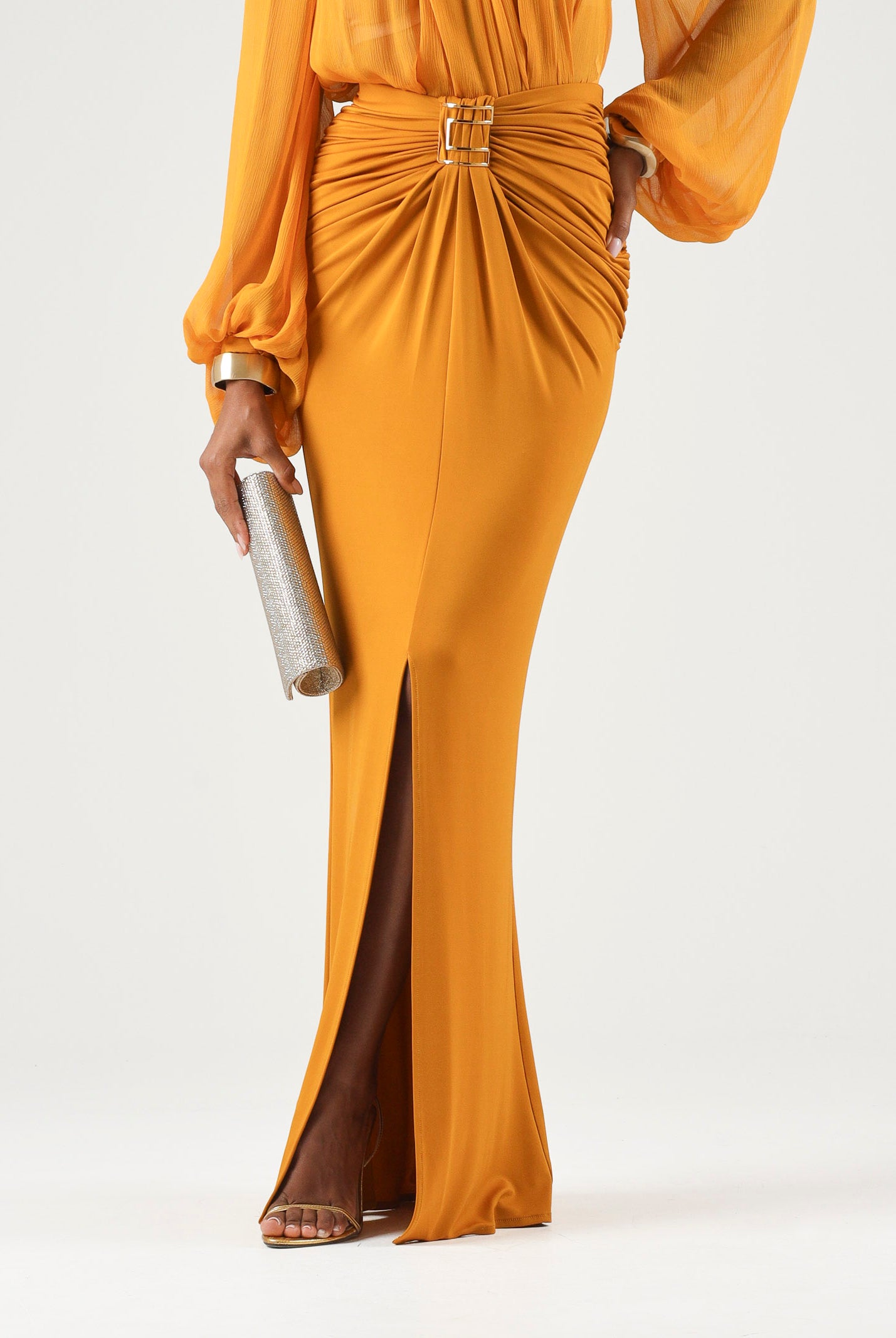 ELISABETTA FRANCHI Gonna in jersey ambra-giallo ocra da donna con drappeggi e spacco anteriore. GO25167E2 940 ELISABETTA FRANCHI