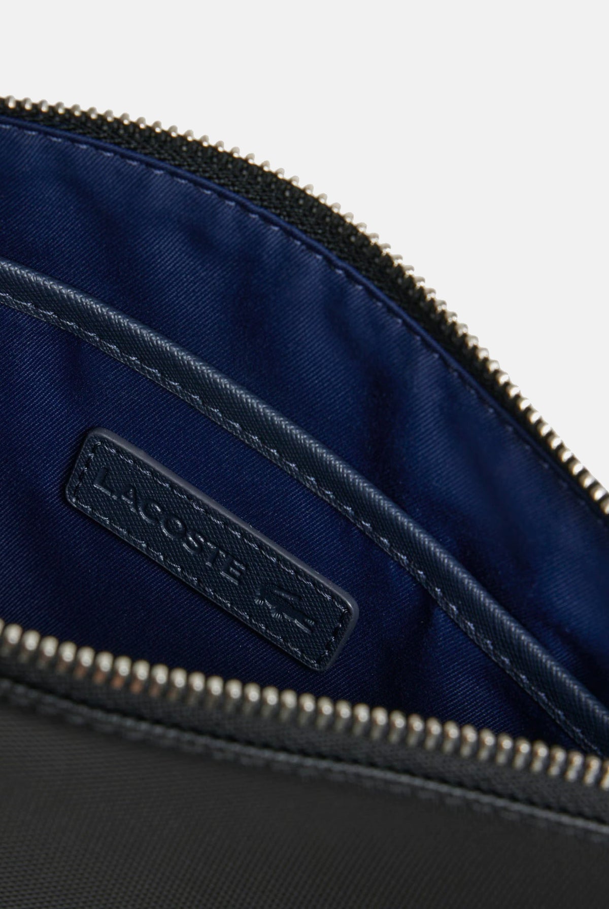 LACOSTE Pochette THE BLEND POUCH nera da uomo con chiusura a zip, cinturino da polso NH5082 000 LACOSTE