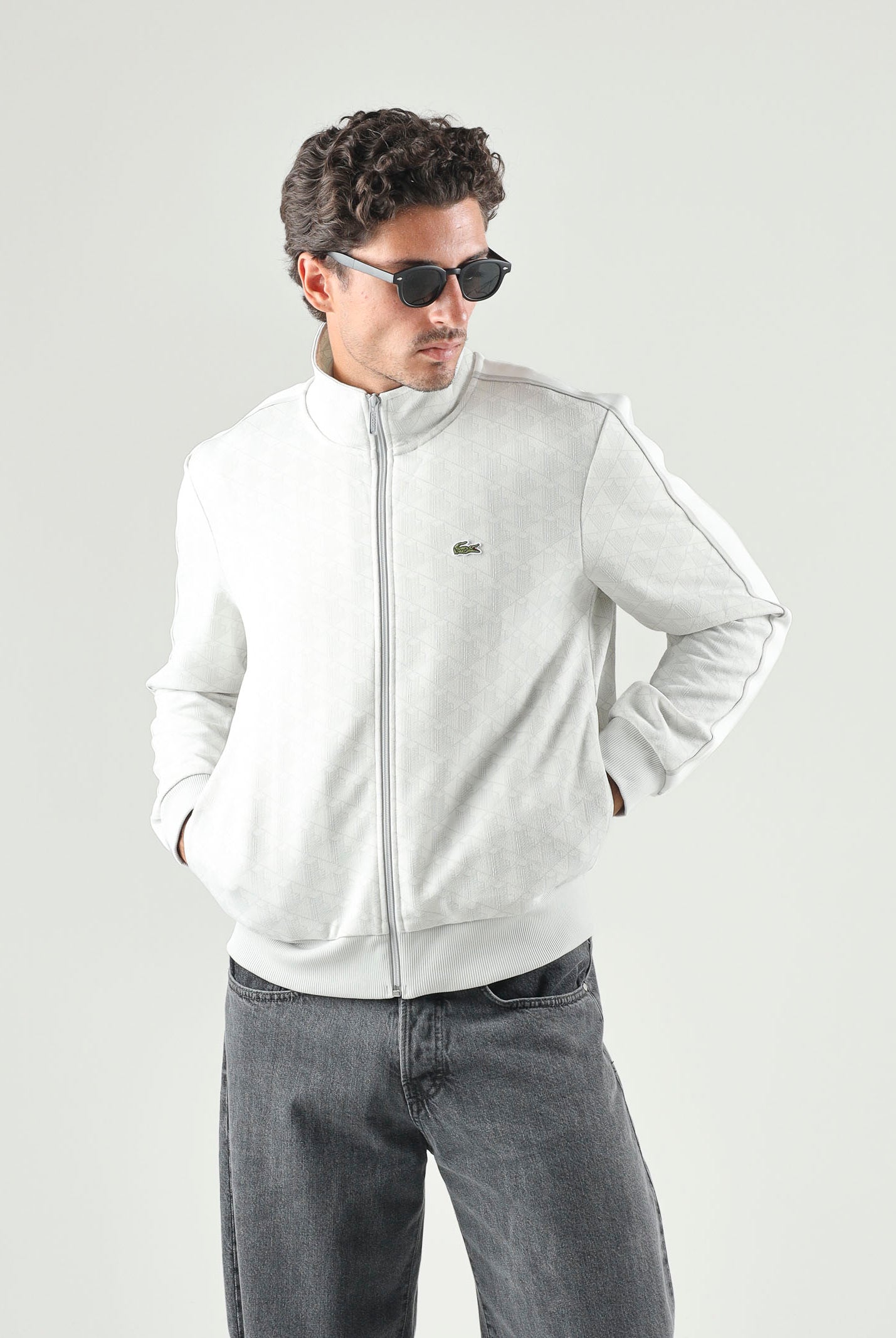 LACOSTE Felpa con zip ghiaccio-bianco da uomo con motivo monogramma jacquard. SH1368 4IW LACOSTE