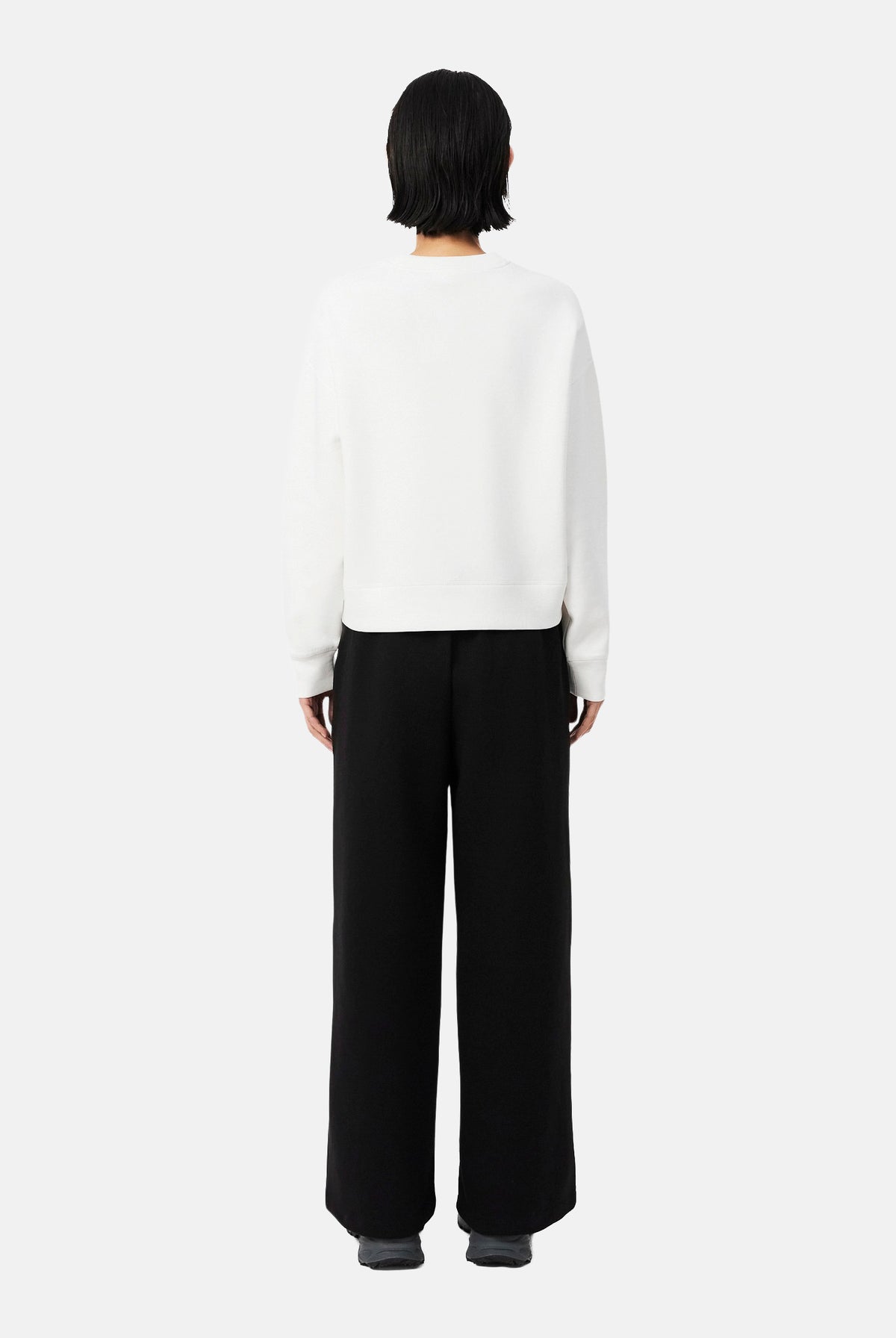LACOSTE Pantaloni WIDE-LEG SWEATPANTS neri da donna, con gamba ampia, coulisse in vita, tasche laterali e mini logo sulla gamba. XF0041 031 LACOSTE