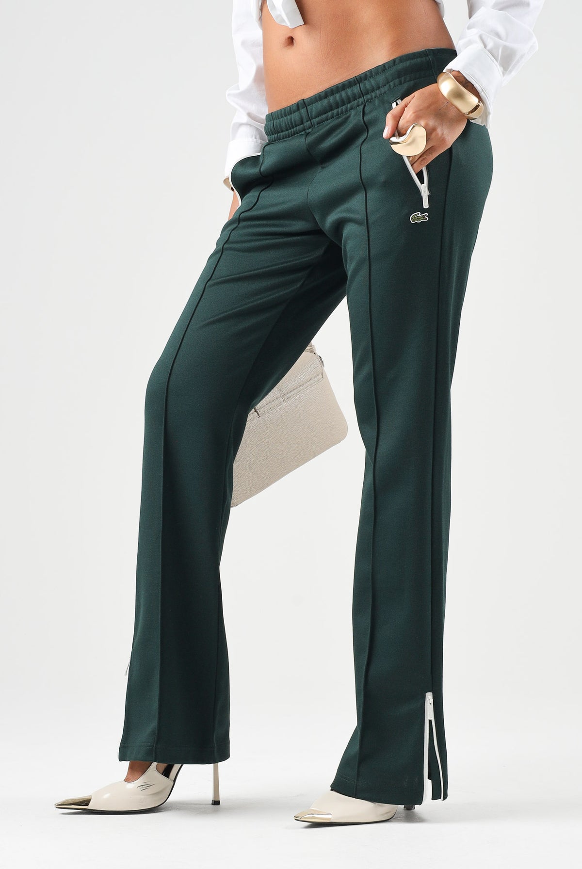 LACOSTE Pantaloni SPORT TRACK PANTS verde per donna con bande laterali a contrasto e tasche con zip. XF5253 YZP LACOSTE