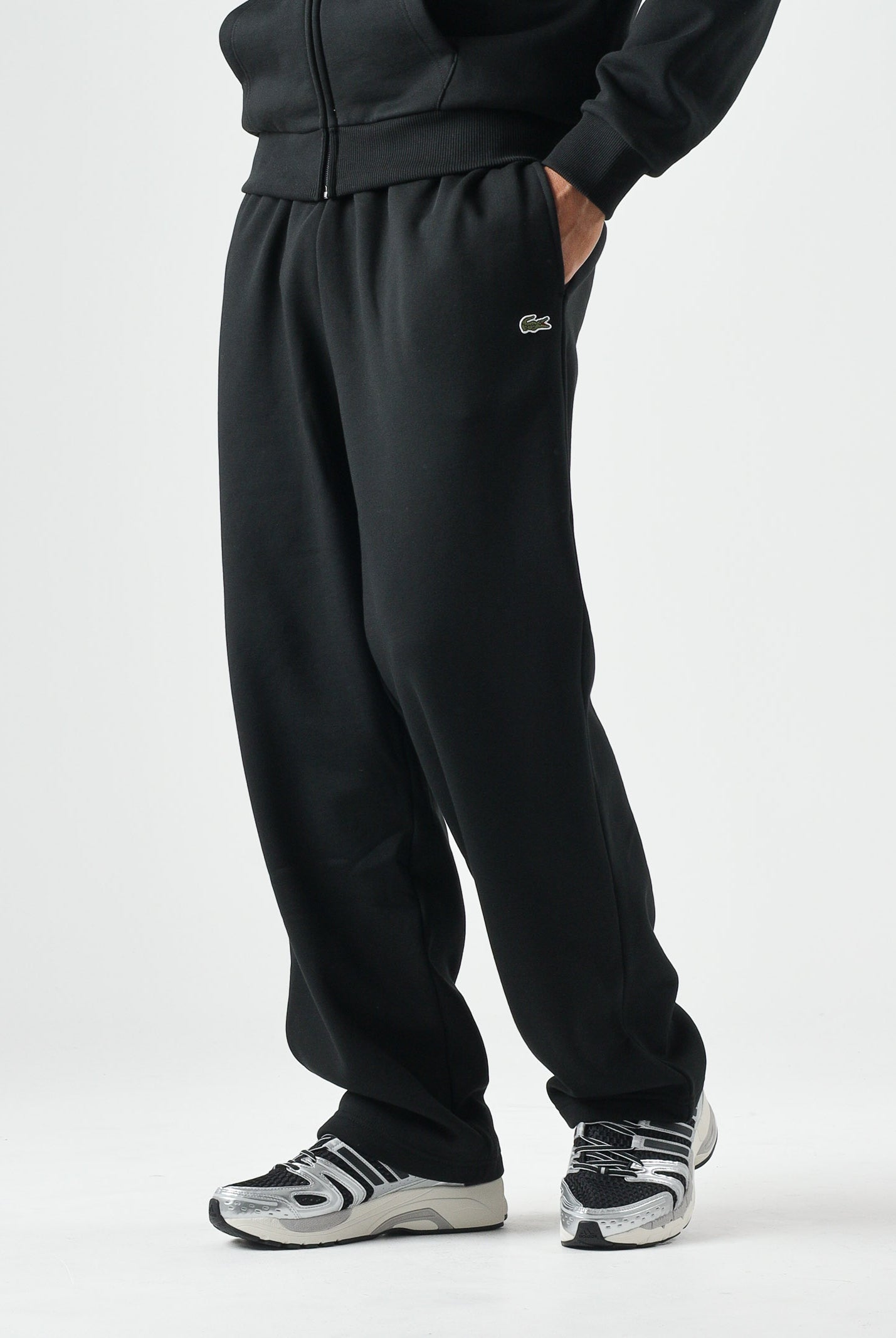 LACOSTE Pantaloni sportivi neri da uomo e donna con coccodrillo ricamato. XH8867 031 LACOSTE