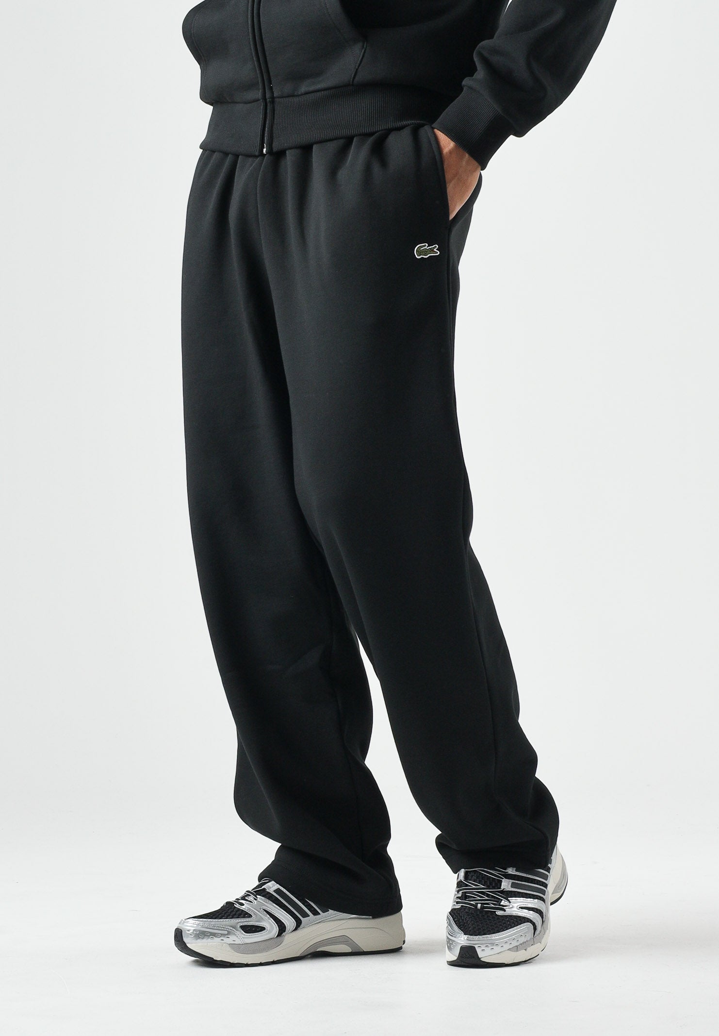LACOSTE Pantaloni sportivi neri da uomo e donna con coccodrillo ricamato. XH8867 031 LACOSTE