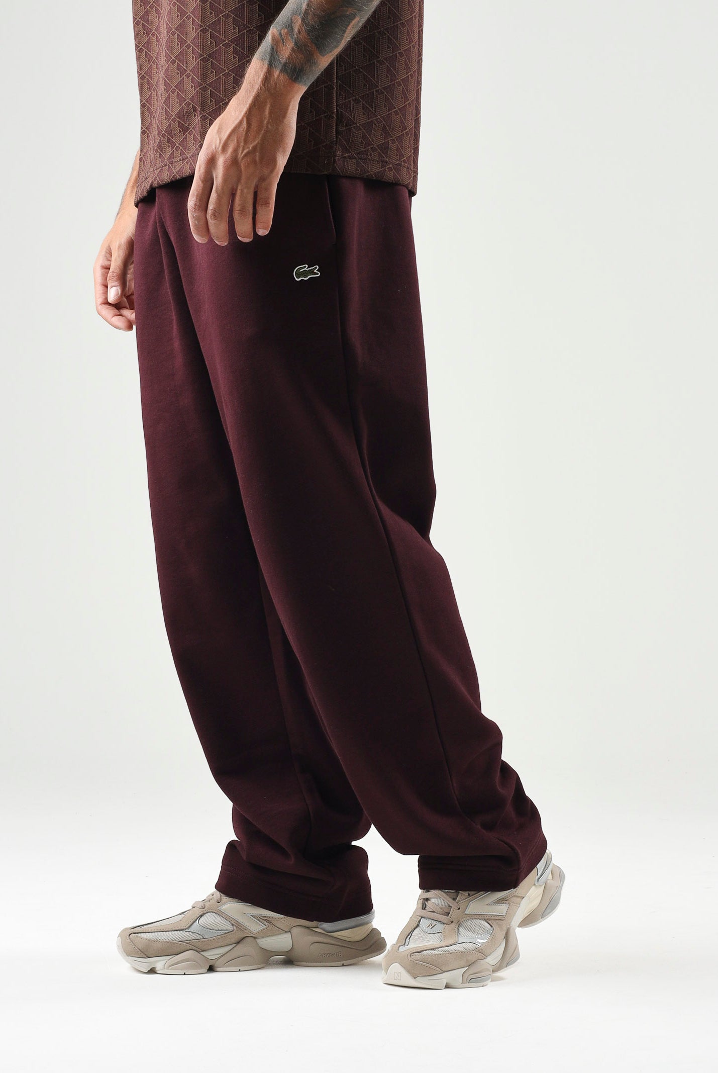 LACOSTE Pantaloni sportivi bordeaux per uomo e donna con logo ricamato. XH8867 3KE LACOSTE