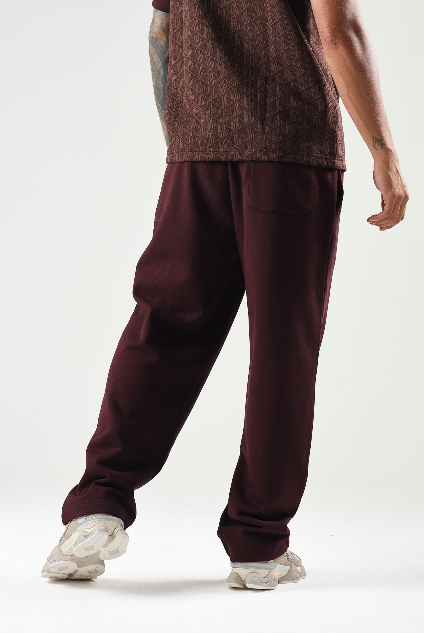 LACOSTE Pantaloni sportivi bordeaux per uomo e donna con logo ricamato. XH8867 3KE LACOSTE