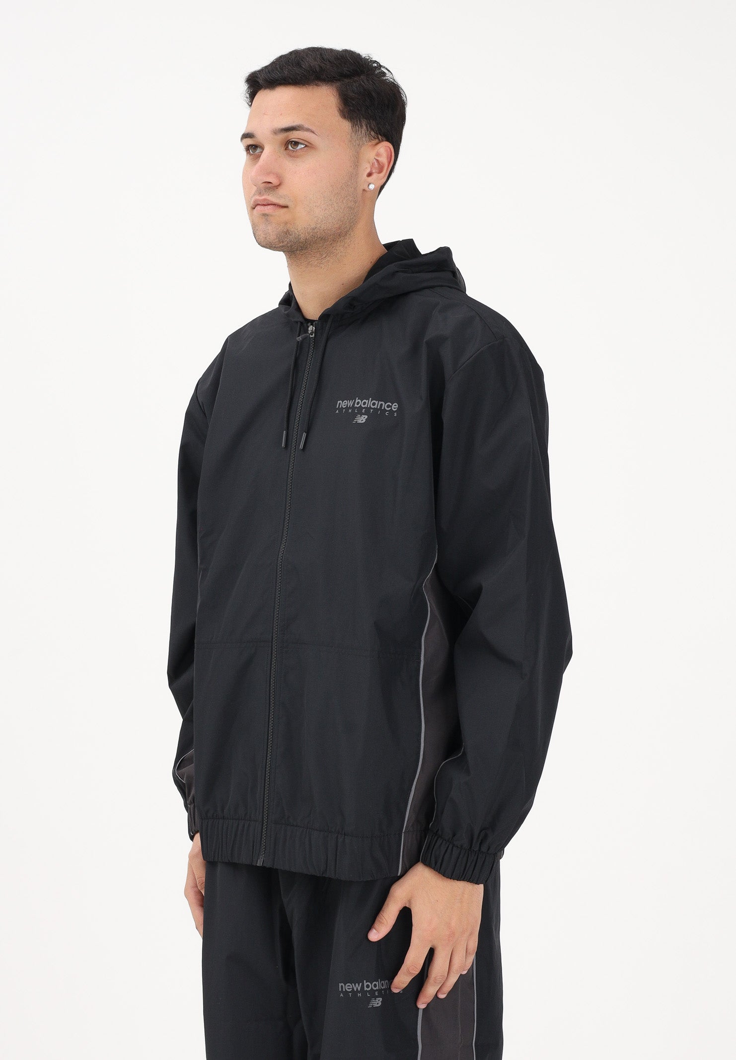 NEW BALANCE Giacca a vento Trackside nera da uomo MJ61A4P8BK . NEW BALANCE