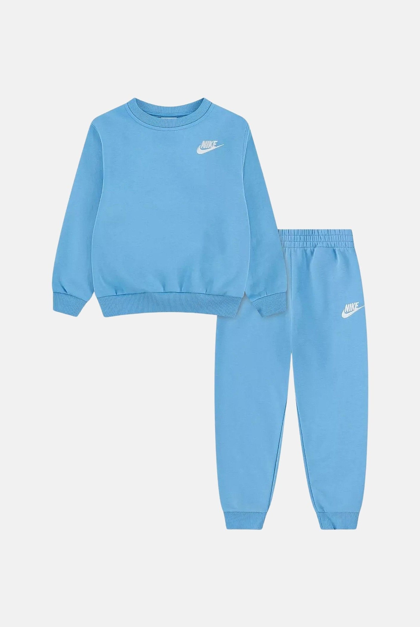 NIKE Tuta sportiva celeste per bambino e bambina con felpa girocollo e pantaloni coordinati logati. 86M877 UR2 NIKE