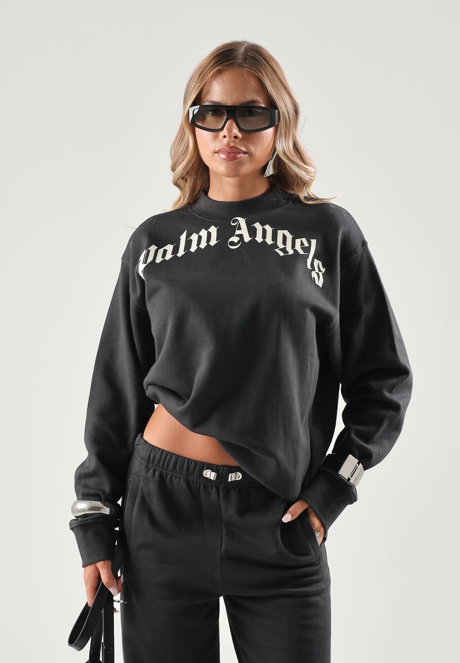 PALM ANGELS Felpa girocollo nera per donna, ragazzi e bambini con logo arcato stampato sulle spalle. F6PAJBSW014 110 PALM ANGELS