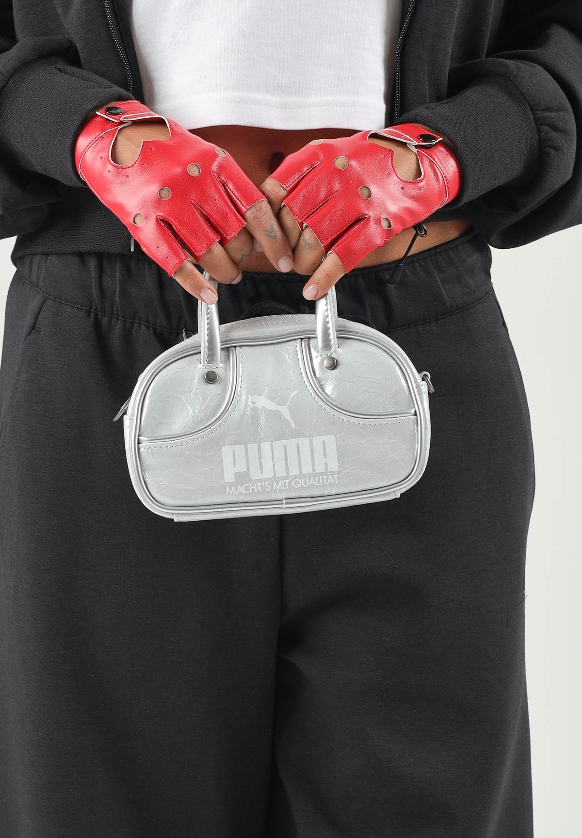 PUMA Borsa mini a mano grigio da donna con finitura metallizzata, doppi manici e tracolla removibile. 092862 01 PUMA