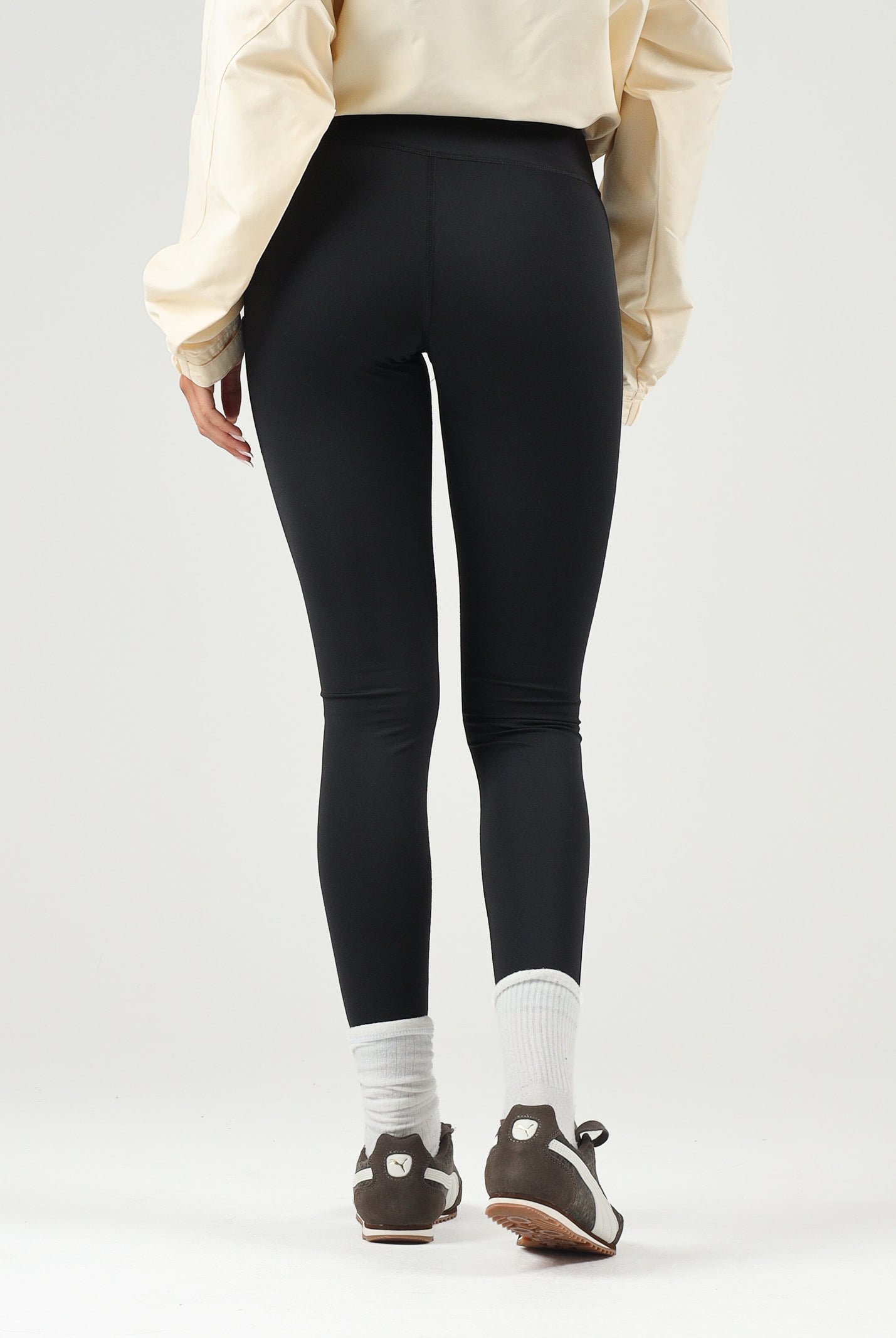 PUMA Leggings sportivo nero per donna con cintura elastica logata incrociata. 528498 01 PUMA
