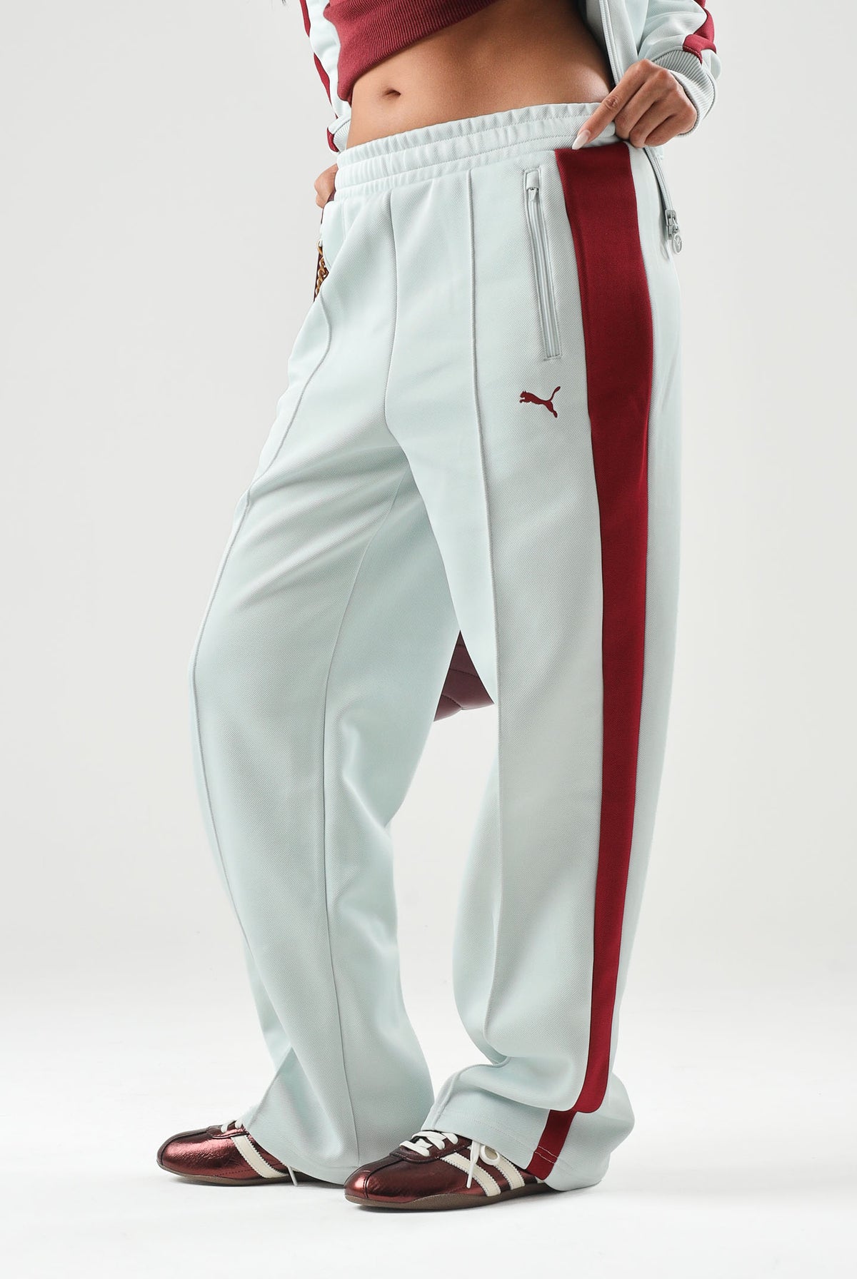 PUMA Pantaloni sportivi T7 Always verde acqua da donna con bande laterali rosse 629797 29 PUMA