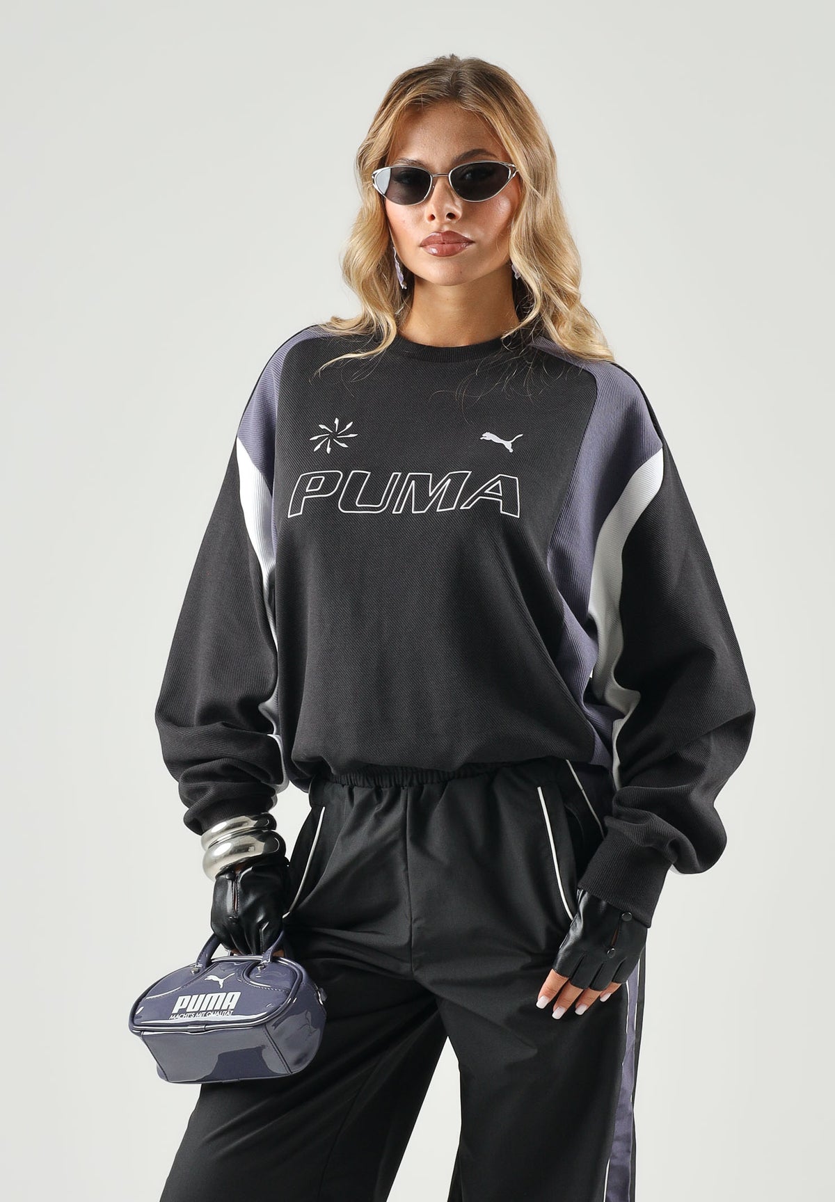 PUMA Felpa girocollo MOTO CREWNECK nera per uomo e donna con dettagli color block, logo frontale 636723 01 PUMA