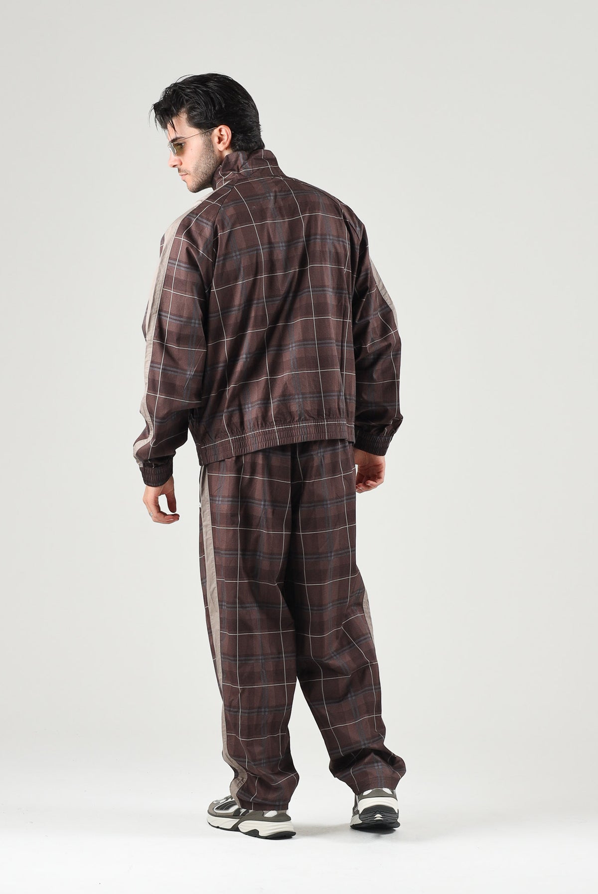 PUMA Pantaloni PLAID TRACK PANTS marrone per uomo con fantasia tartan, bande laterali tono su tono 636732 33 PUMA