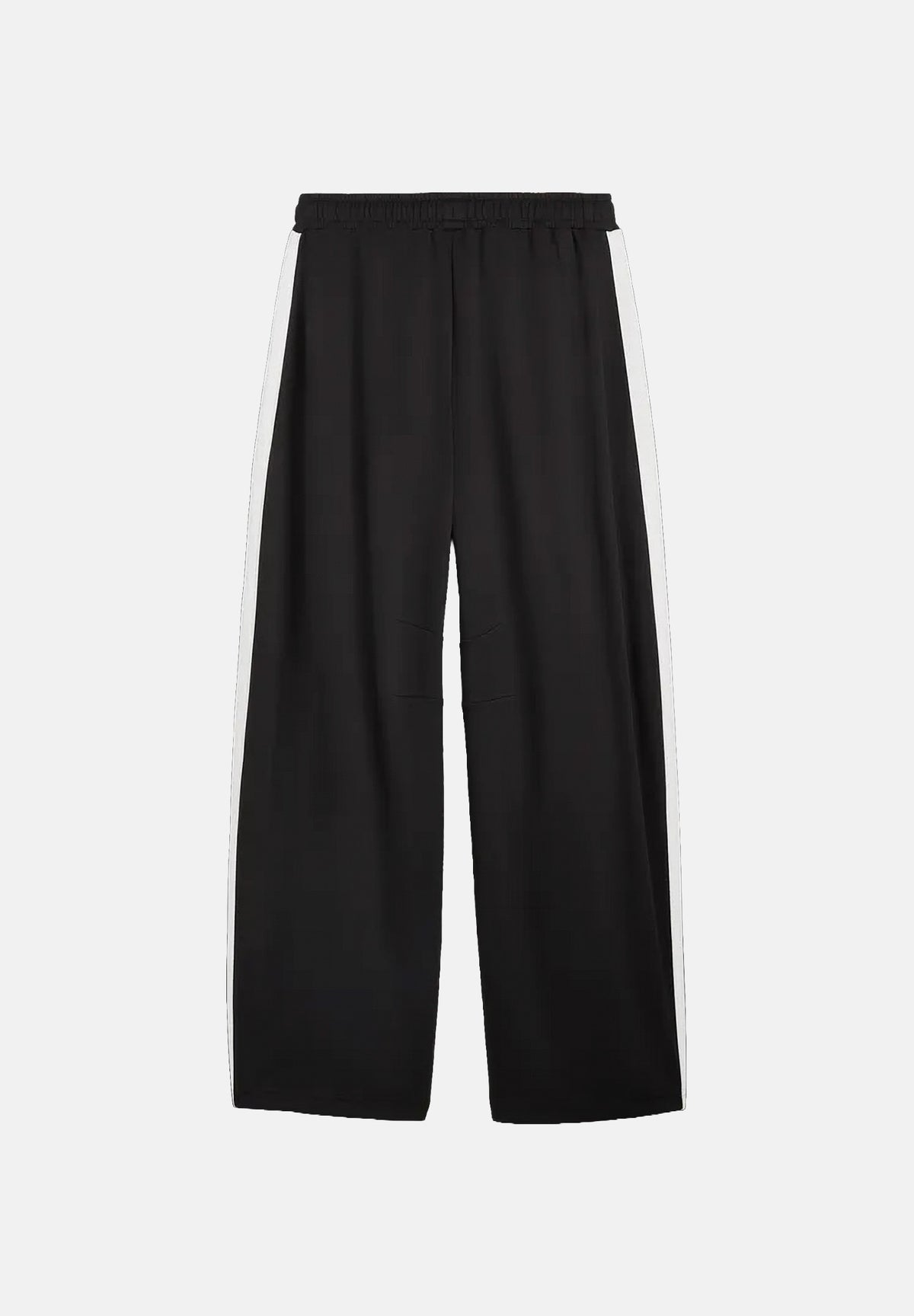 PUMA Pantalone OVERSIZED TRACK nero per uomo con bande laterali bicolore e linea dritto-ampia. 636736 01 PUMA