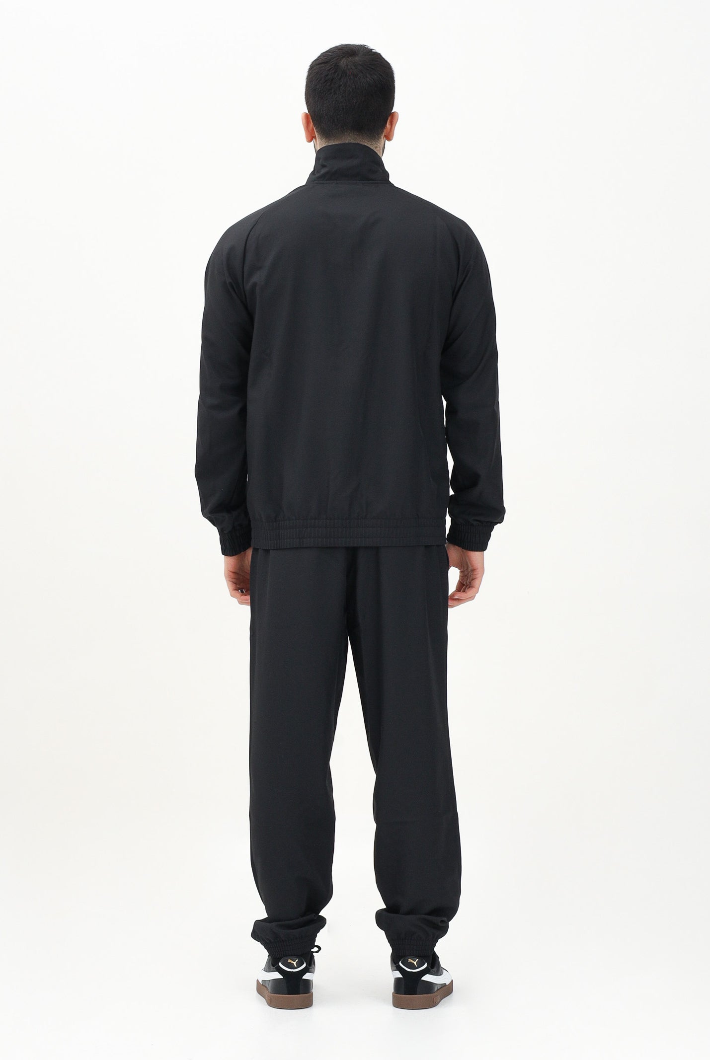 PUMA Tuta nera da uomo con piping intrecciato 684849 01 PUMA