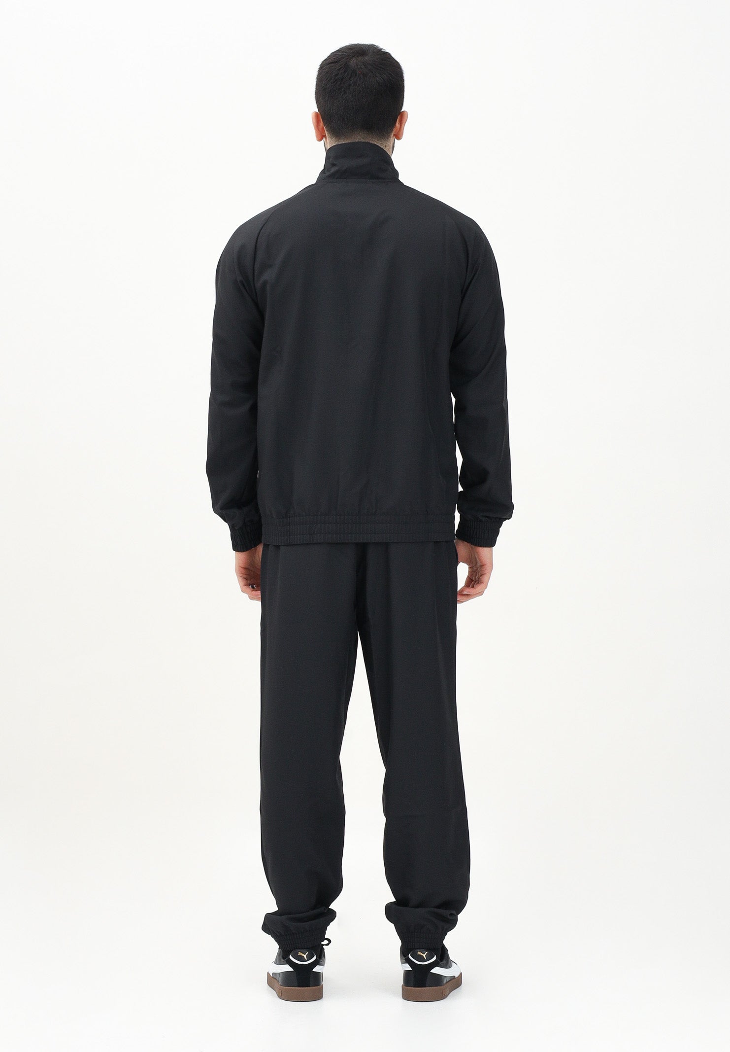PUMA Tuta nera da uomo con piping intrecciato 684849 01 PUMA