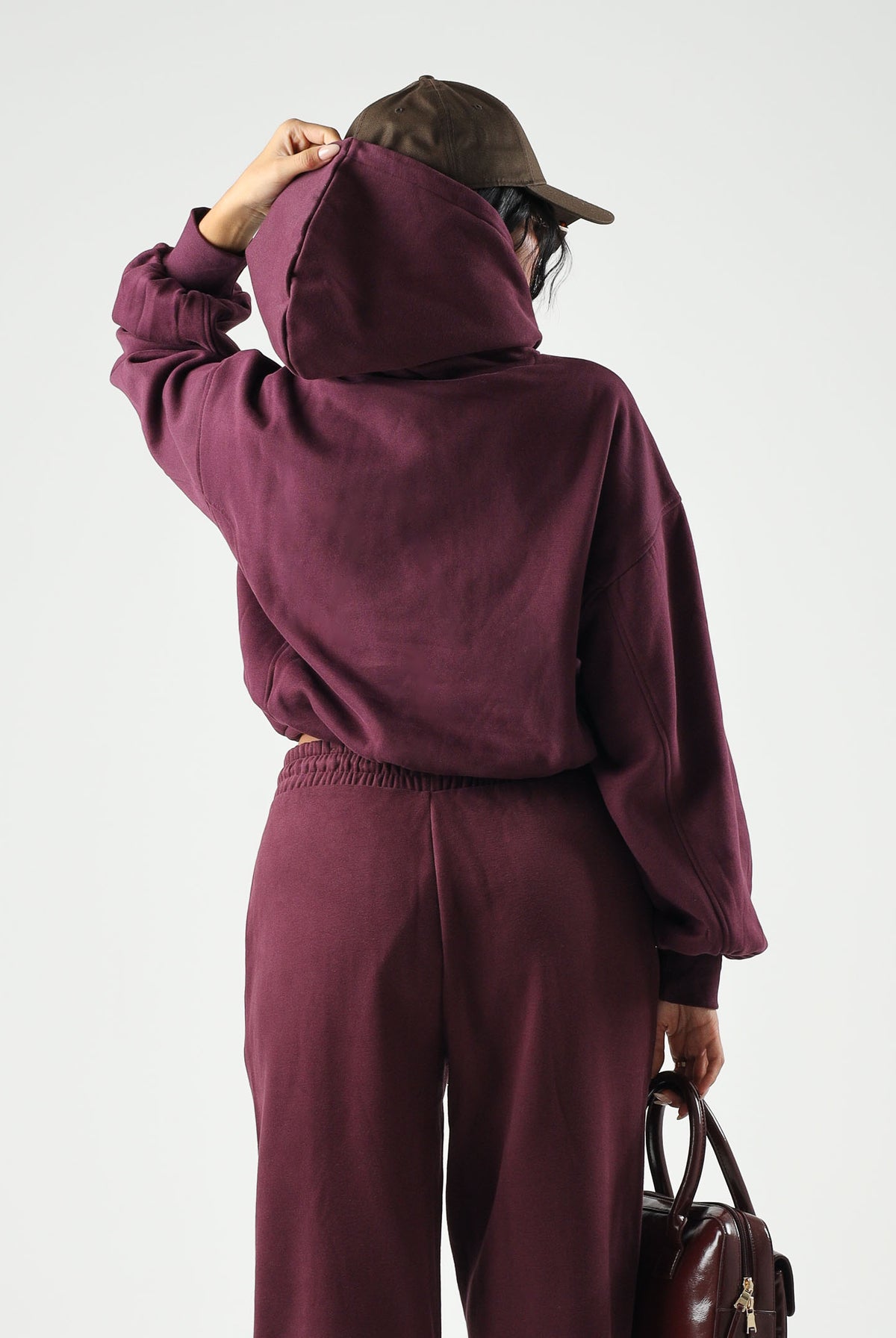 PUMA Felpa con cappuccio HOODIE bordeaux da donna con maniche a palloncino<BR/> 694027 24 PUMA