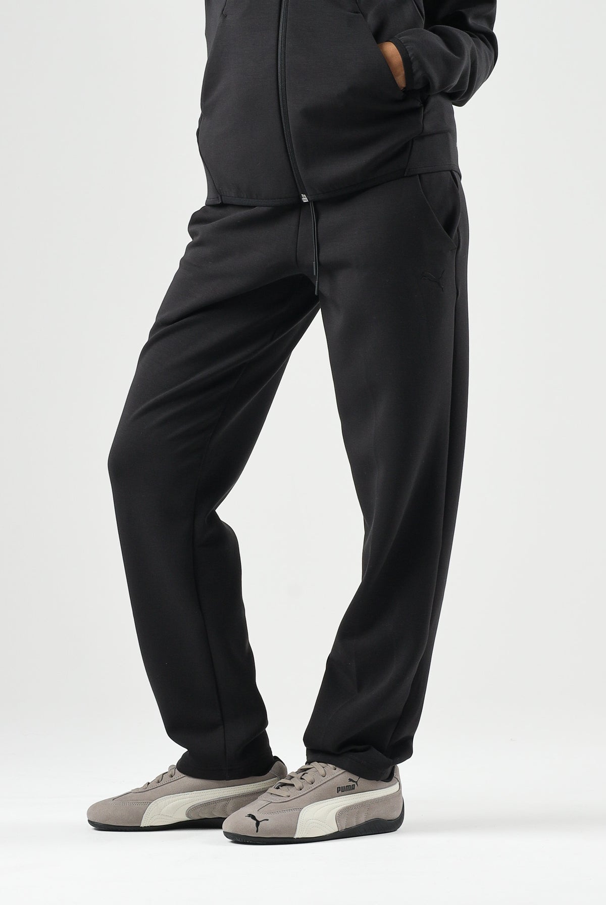PUMA Pantaloni STRAIGHT LEG neri da donna con vita elasticizzata, coulisse e tasche laterali. 694036 01 PUMA