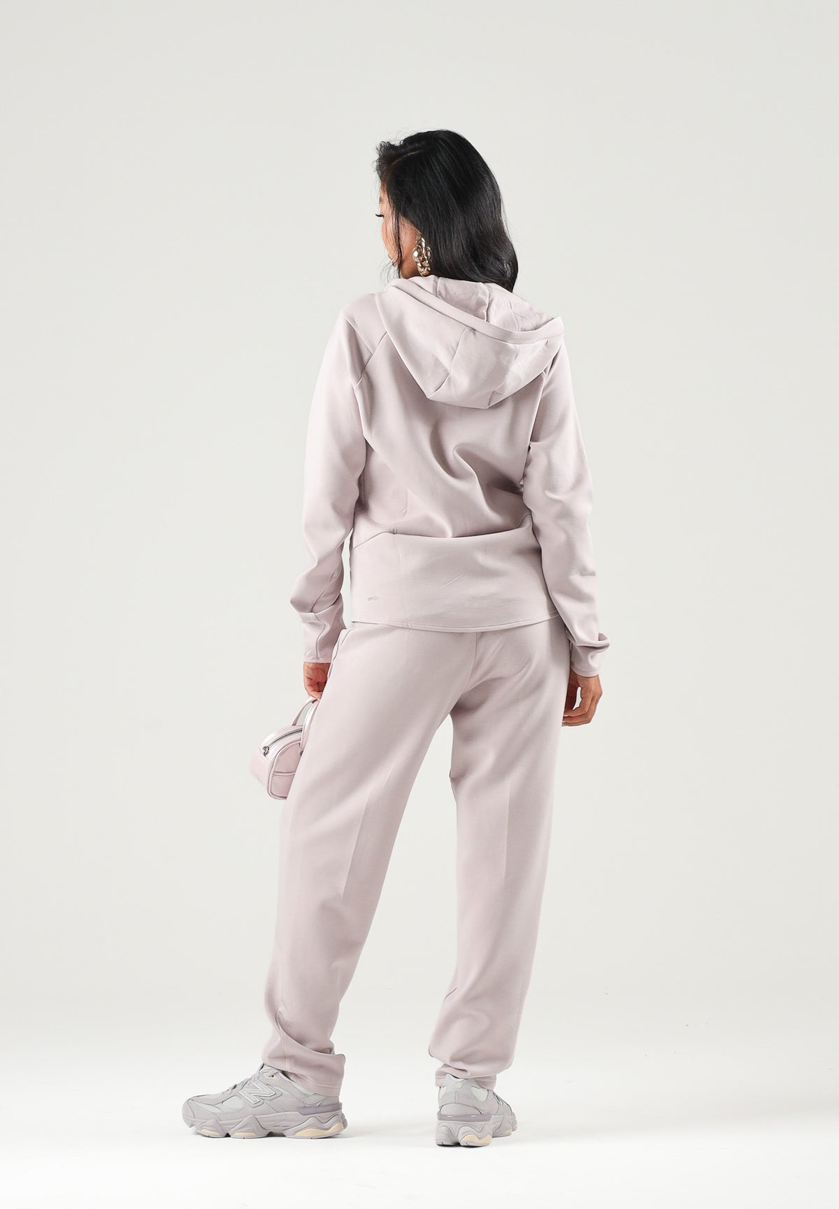 PUMA Felpa con zip EVOSTIPE FULL-ZIP HOODIE rosa da donna con cappuccio integrato e tasche oblique. 694039 49 PUMA