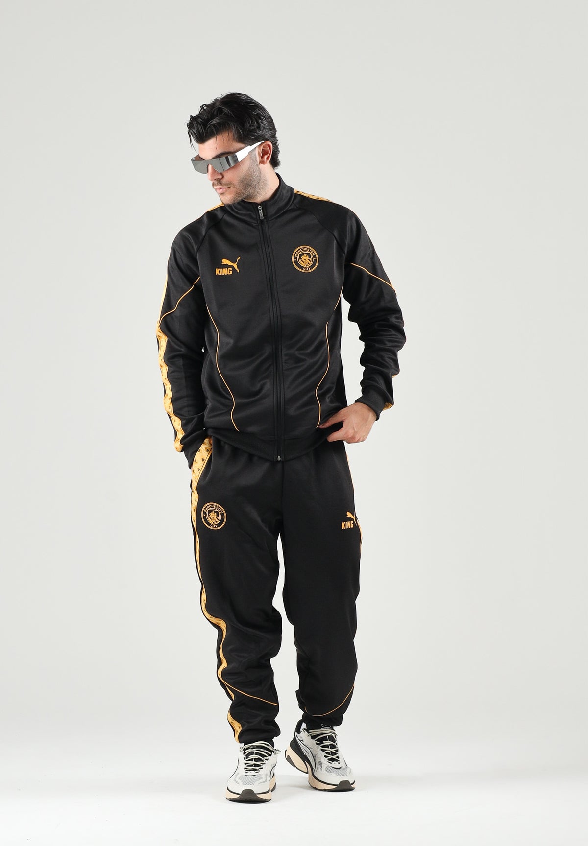 PUMA Felpa con zip MANCHESTER CITY TRACK JACKET nero da uomo dettagli oro. 786296 32 PUMA
