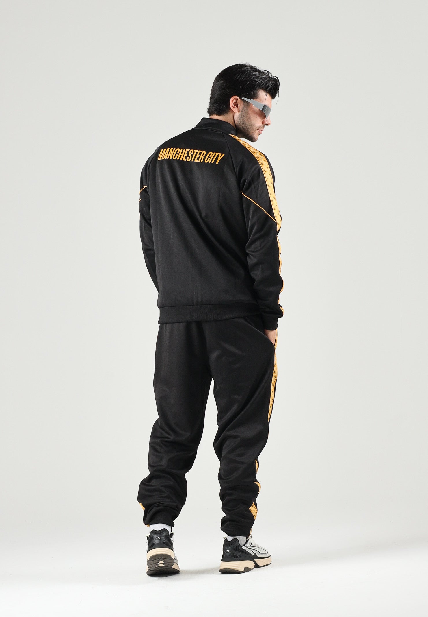 PUMA Felpa con zip MANCHESTER CITY TRACK JACKET nero da uomo dettagli oro. 786296 32 PUMA