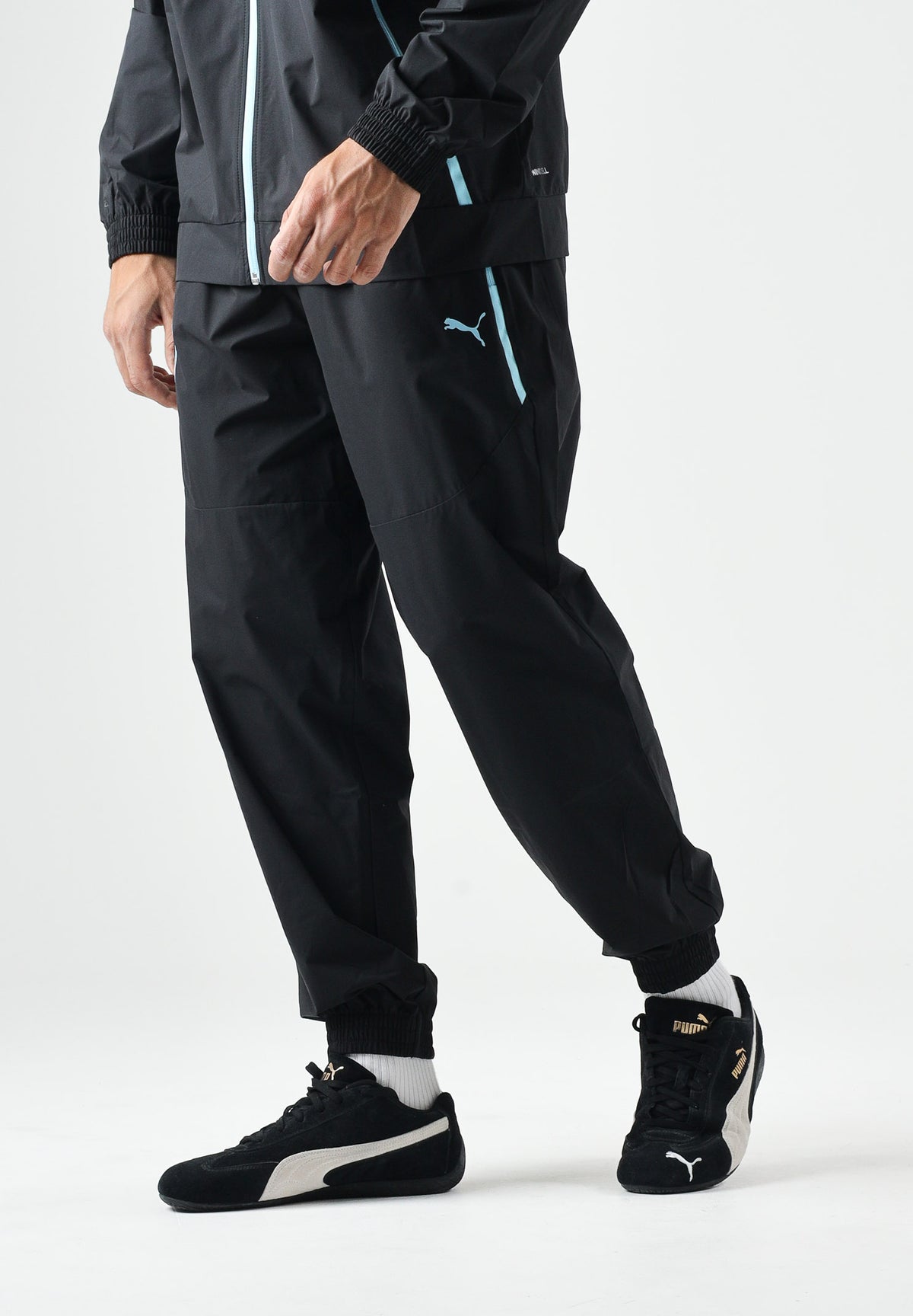 PUMA Pantaloni OLYMPIQUE DE MARSEILLE vibrant blue, blu e nero da uomo con dettagli logo e stemma 786450 20 PUMA