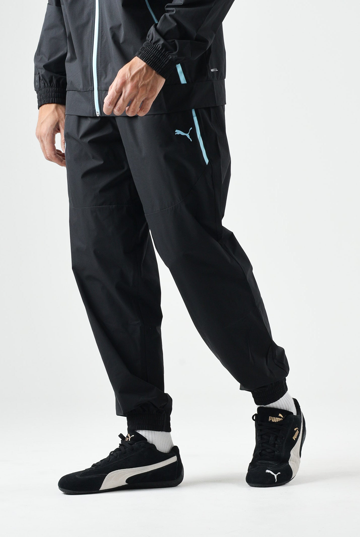 PUMA Pantaloni OLYMPIQUE DE MARSEILLE vibrant blue, blu e nero da uomo con dettagli logo e stemma 786450 20 PUMA