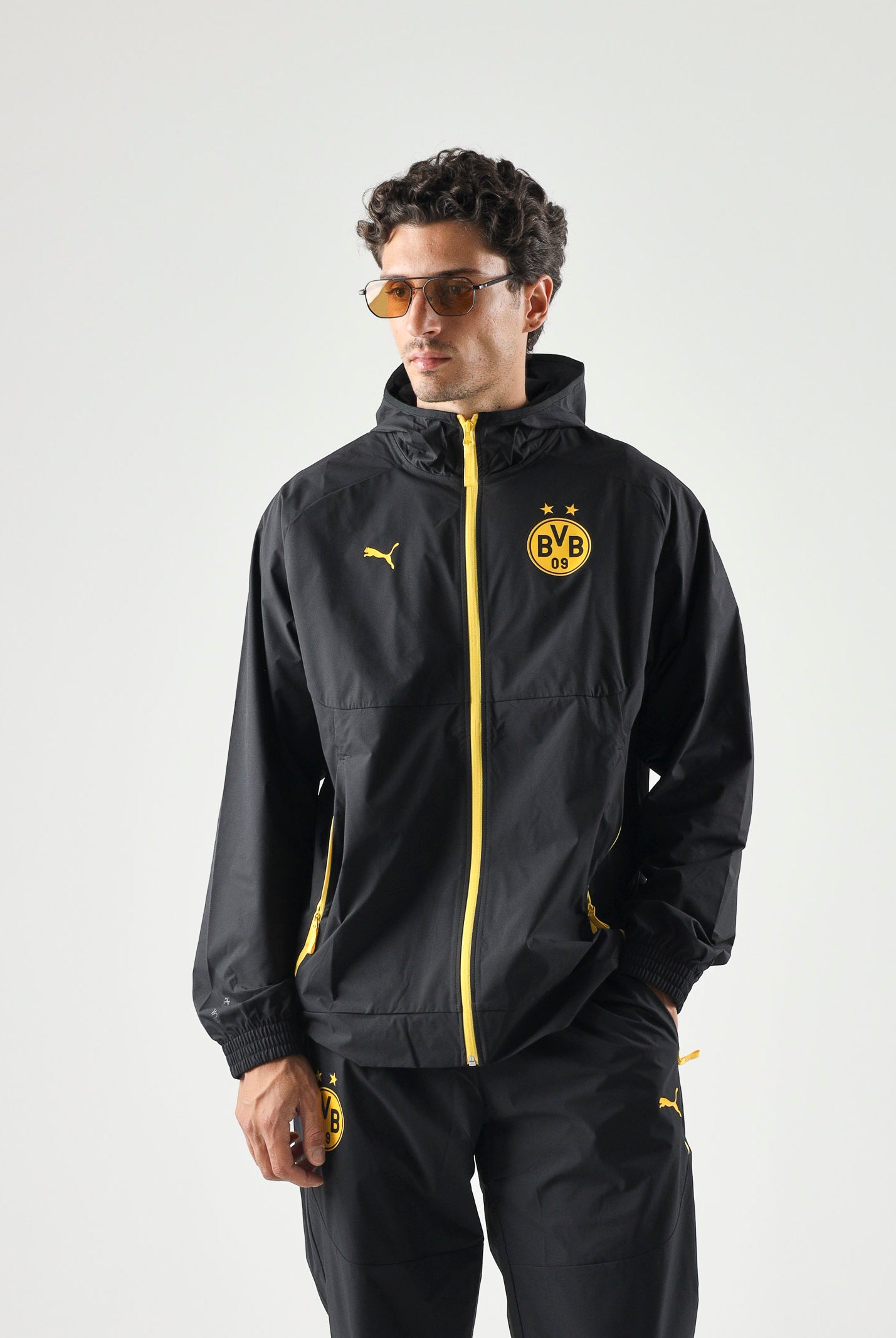 PUMA Giacca BORUSSIA a vento nera da uomo con dettagli a contrasto e stemma<BR/> 786509 07 PUMA