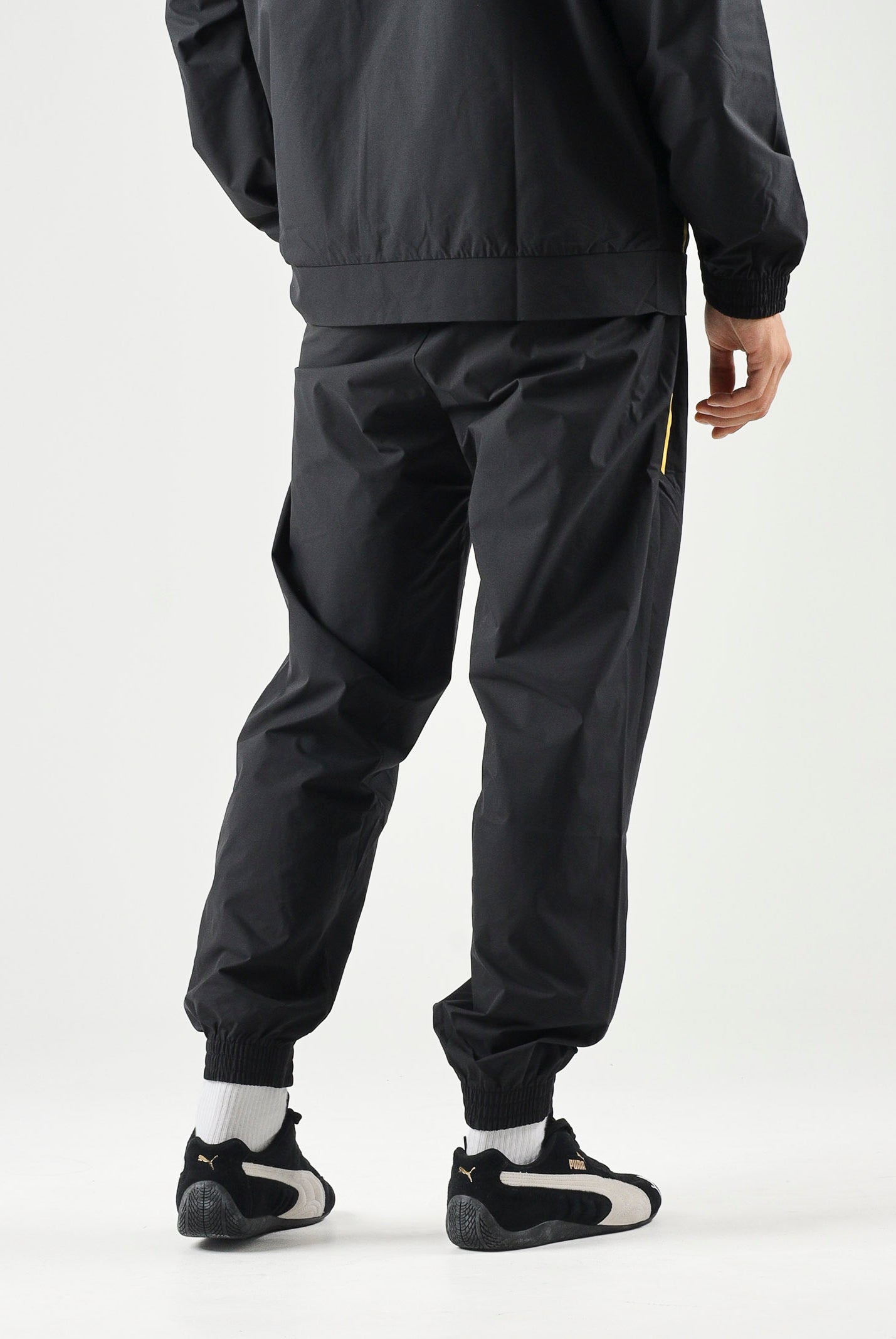 PUMA Pantaloni BORUSSIA DORTMUND nero da uomo con dettagli a contrasto 786510 07 PUMA