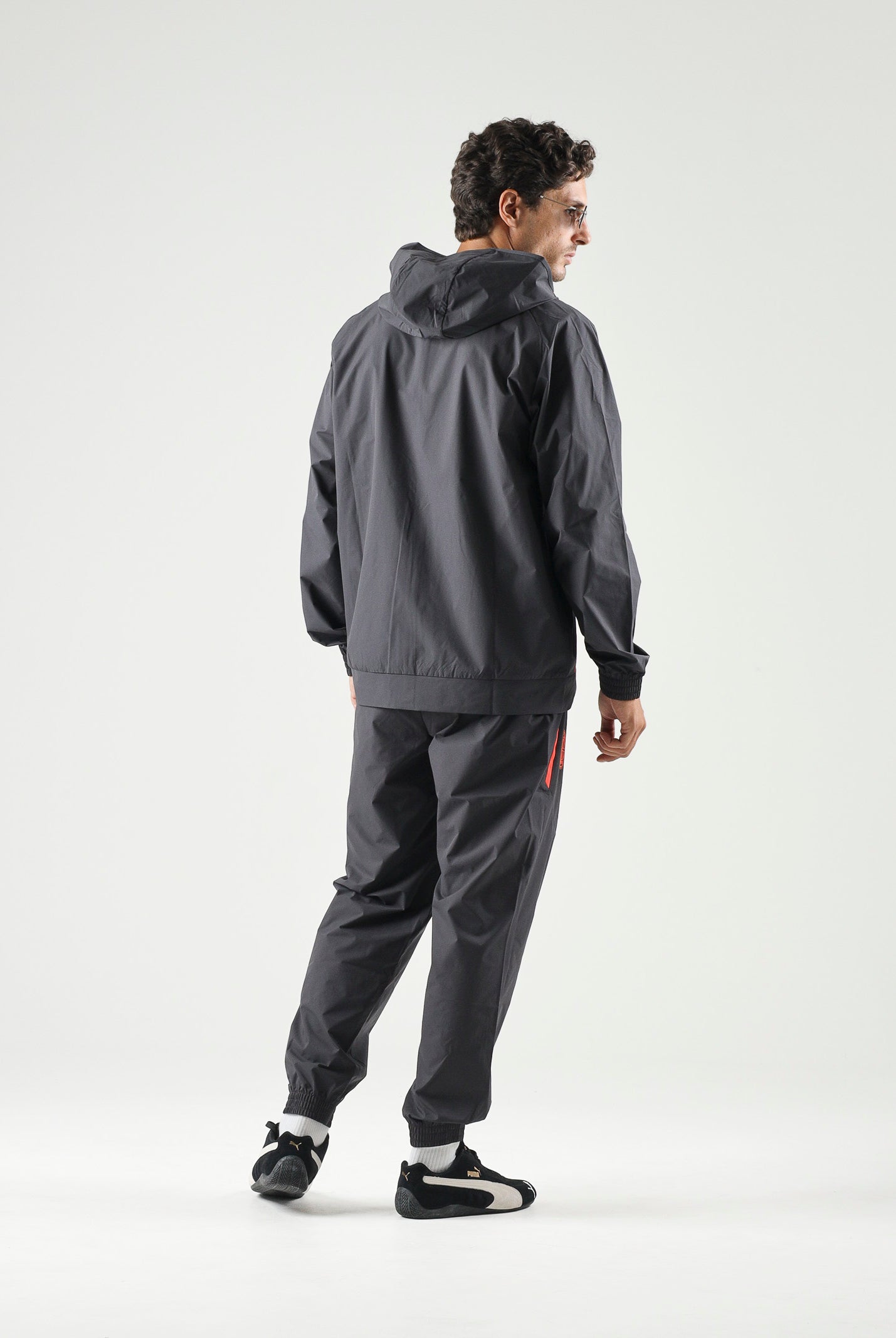 PUMA Pantaloni AC MILAN dark-black, nero da uomo con dettagli a contrasto 786700 20 PUMA