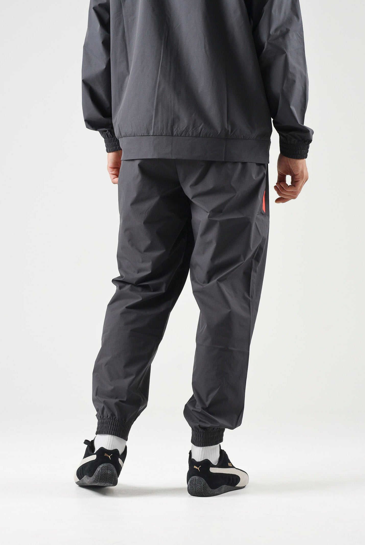 PUMA Pantaloni AC MILAN dark-black, nero da uomo con dettagli a contrasto 786700 20 PUMA