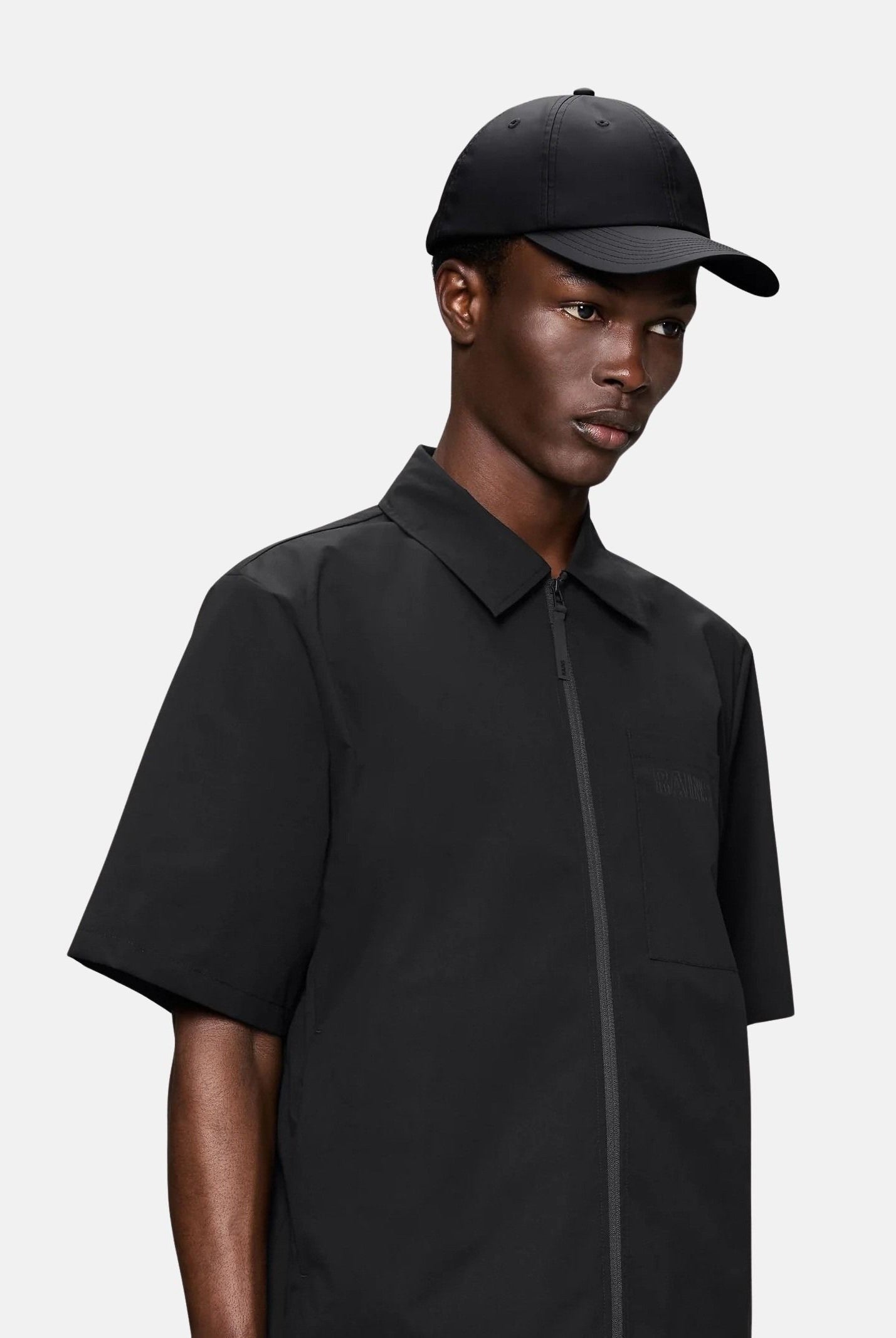 RAINS Cappello con visiera Cap nero per uomo e donna RA13600 BL RAINS