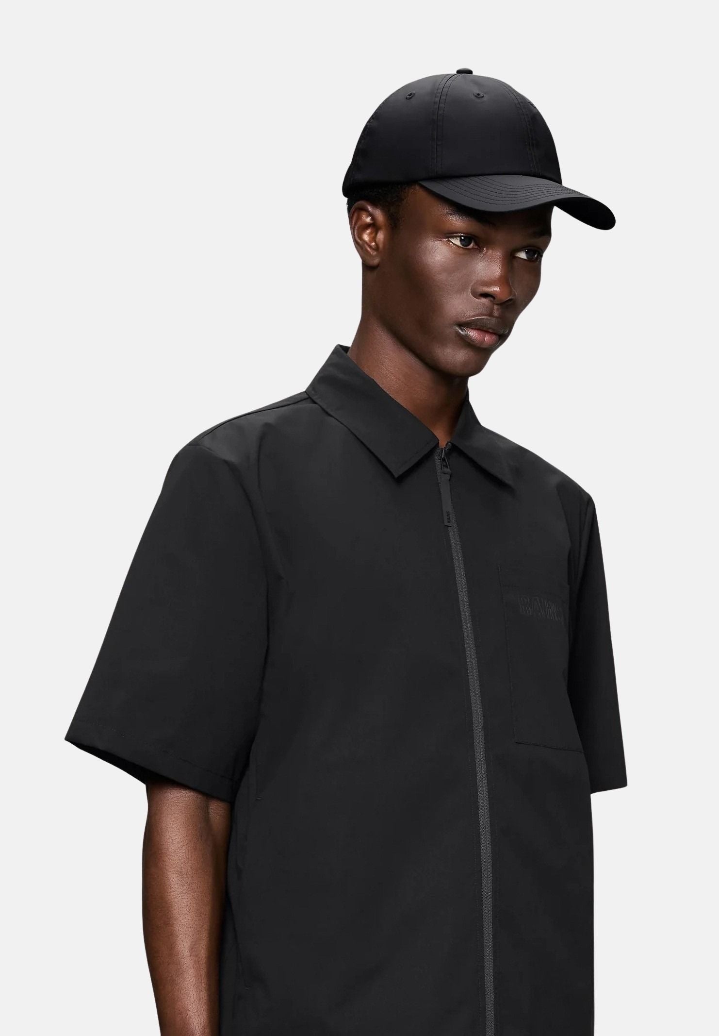 RAINS Cappello con visiera Cap nero per uomo e donna RA13600 BL RAINS