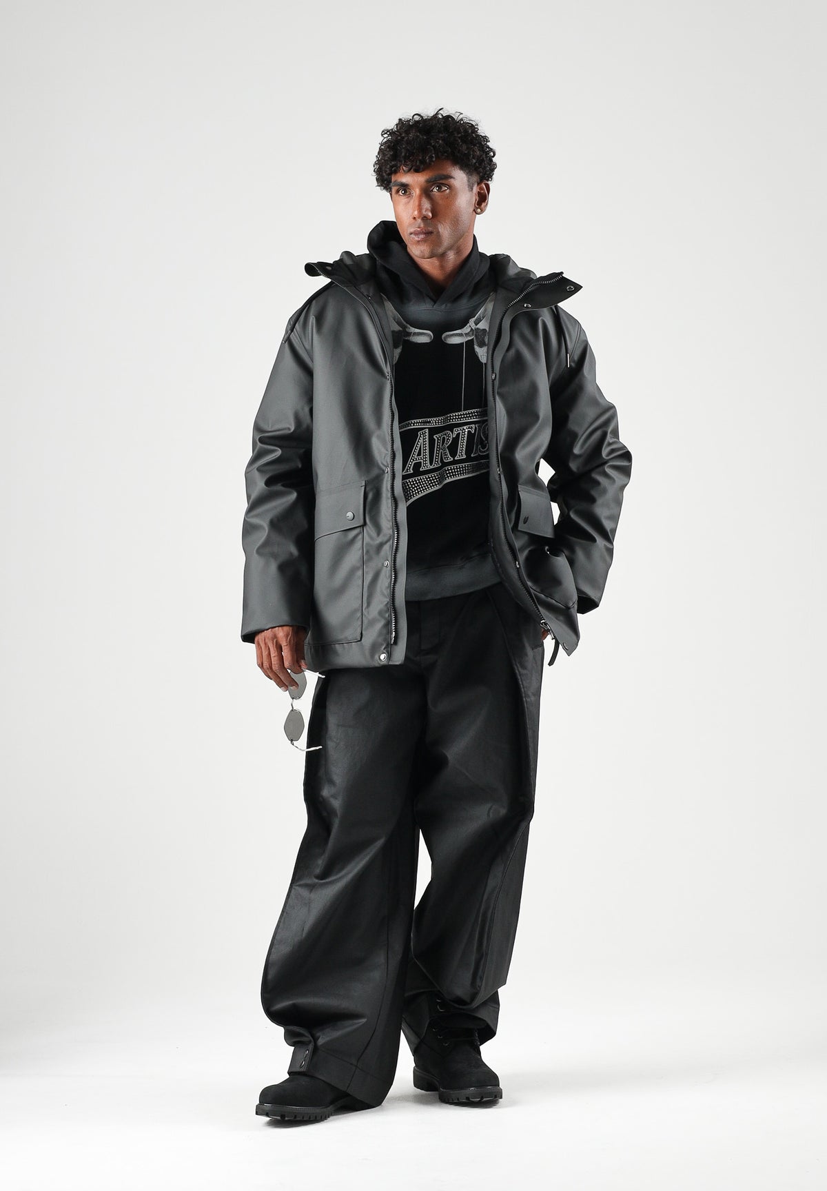 RAINS Parka nero per uomo e donna con cappuccio e visiera RA21450 BL RAINS