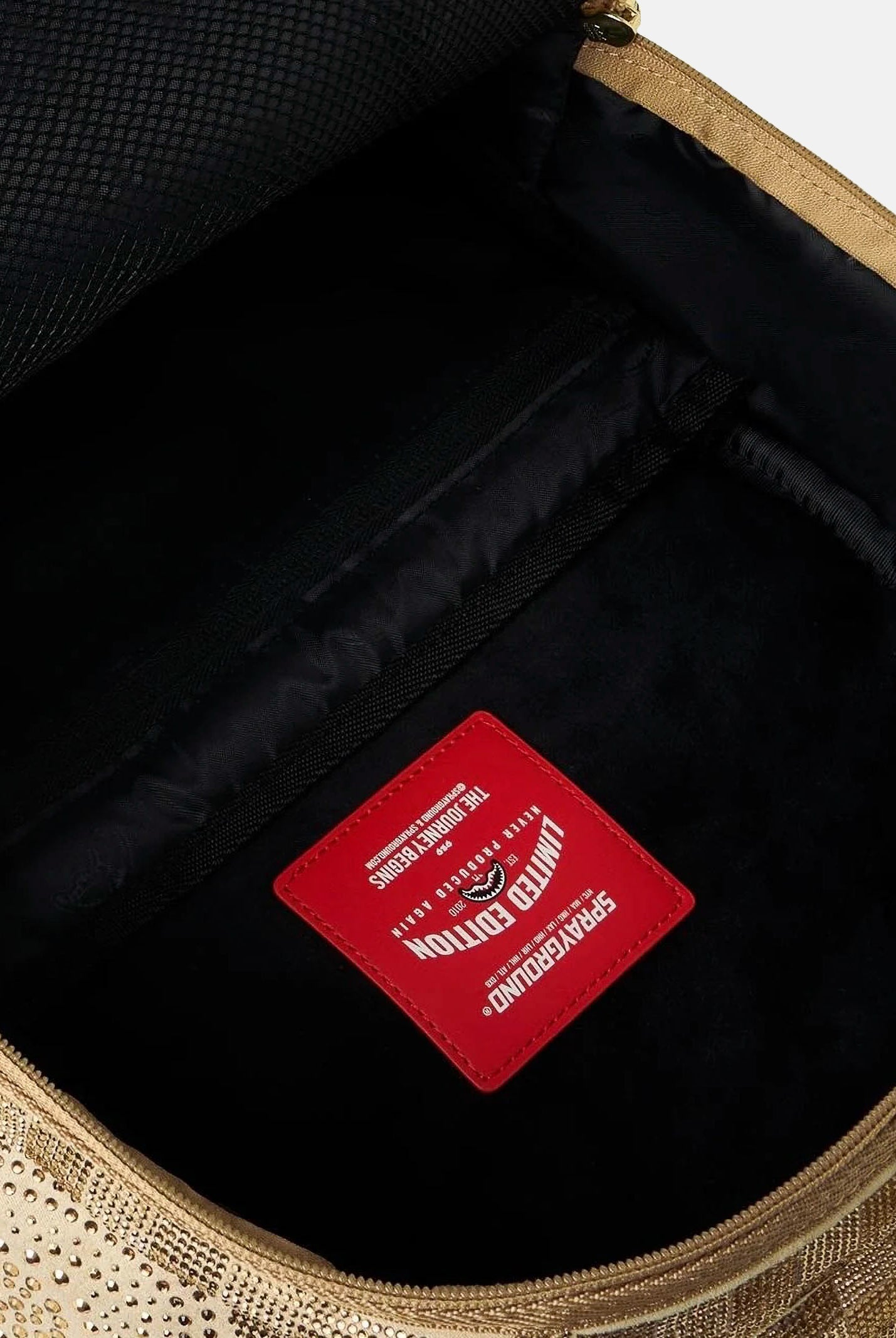 SPRAYGROUND Zaino TONE TRINITY gold per uomo, donna e bambino con finitura effetto oro. 910B8470NSZ . SPRAYGROUND